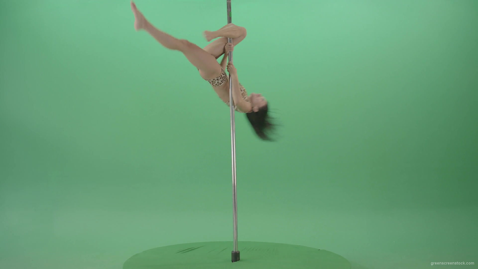 Athletic-sexy-female-model-spinning-on-pilon-in-jaguar-skin-underwear-dancing-pole-dance-on-Green-Screen-4K-Video-Footage-1920_004 Green Screen Stock