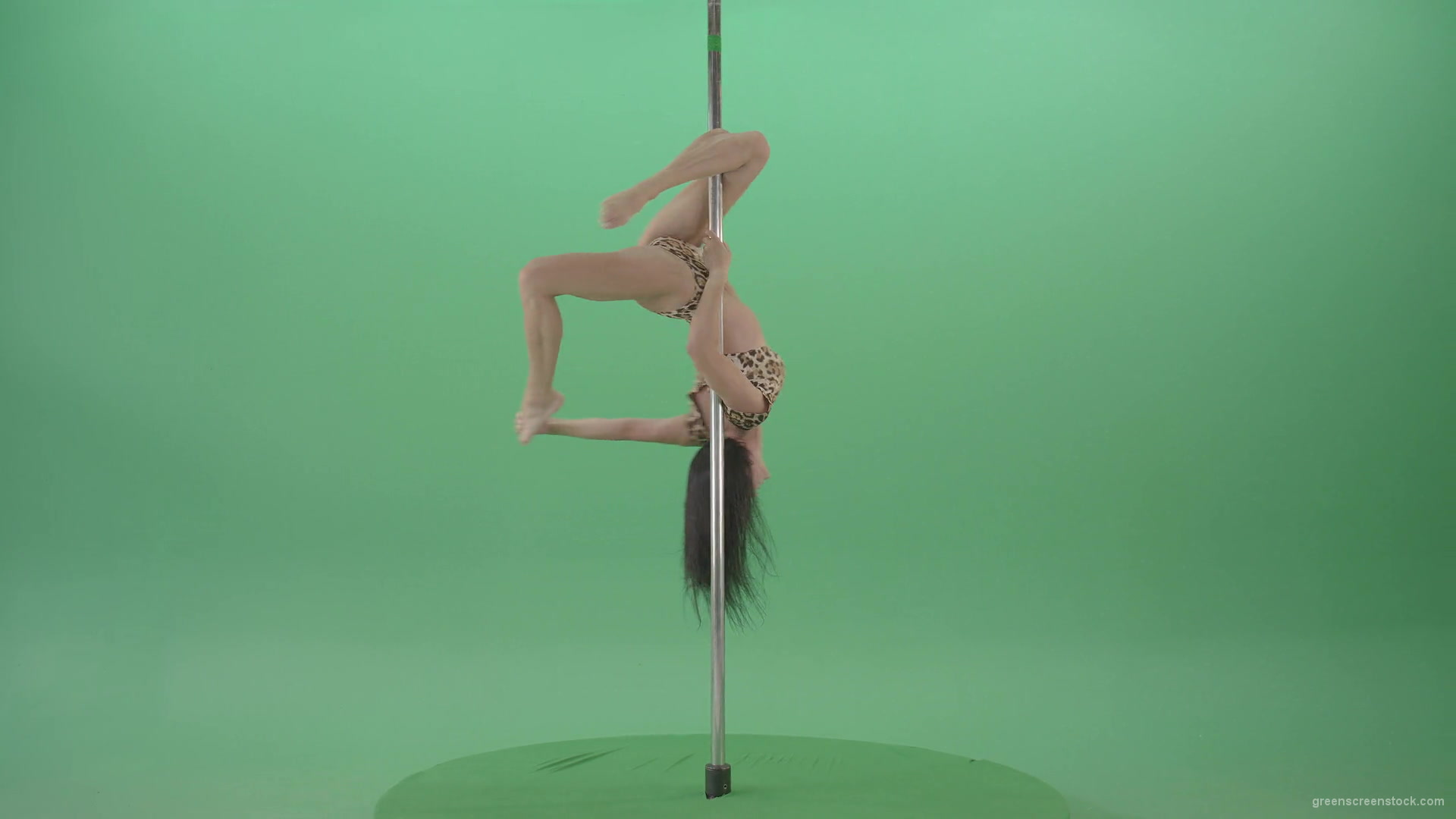 Athletic-sexy-female-model-spinning-on-pilon-in-jaguar-skin-underwear-dancing-pole-dance-on-Green-Screen-4K-Video-Footage-1920_007 Green Screen Stock