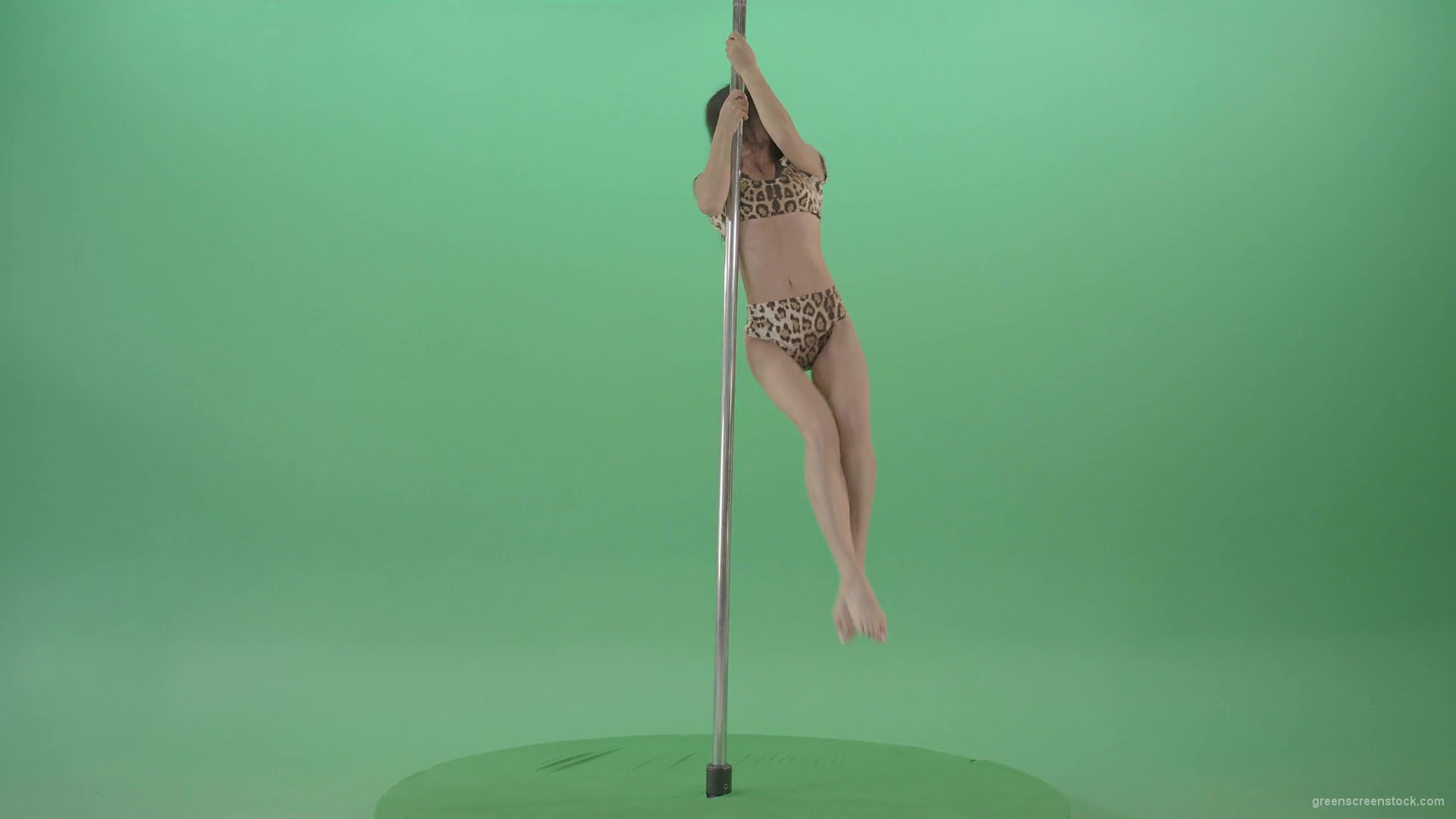 Athletic-sexy-female-model-spinning-on-pilon-in-jaguar-skin-underwear-dancing-pole-dance-on-Green-Screen-4K-Video-Footage-1920_009 Green Screen Stock