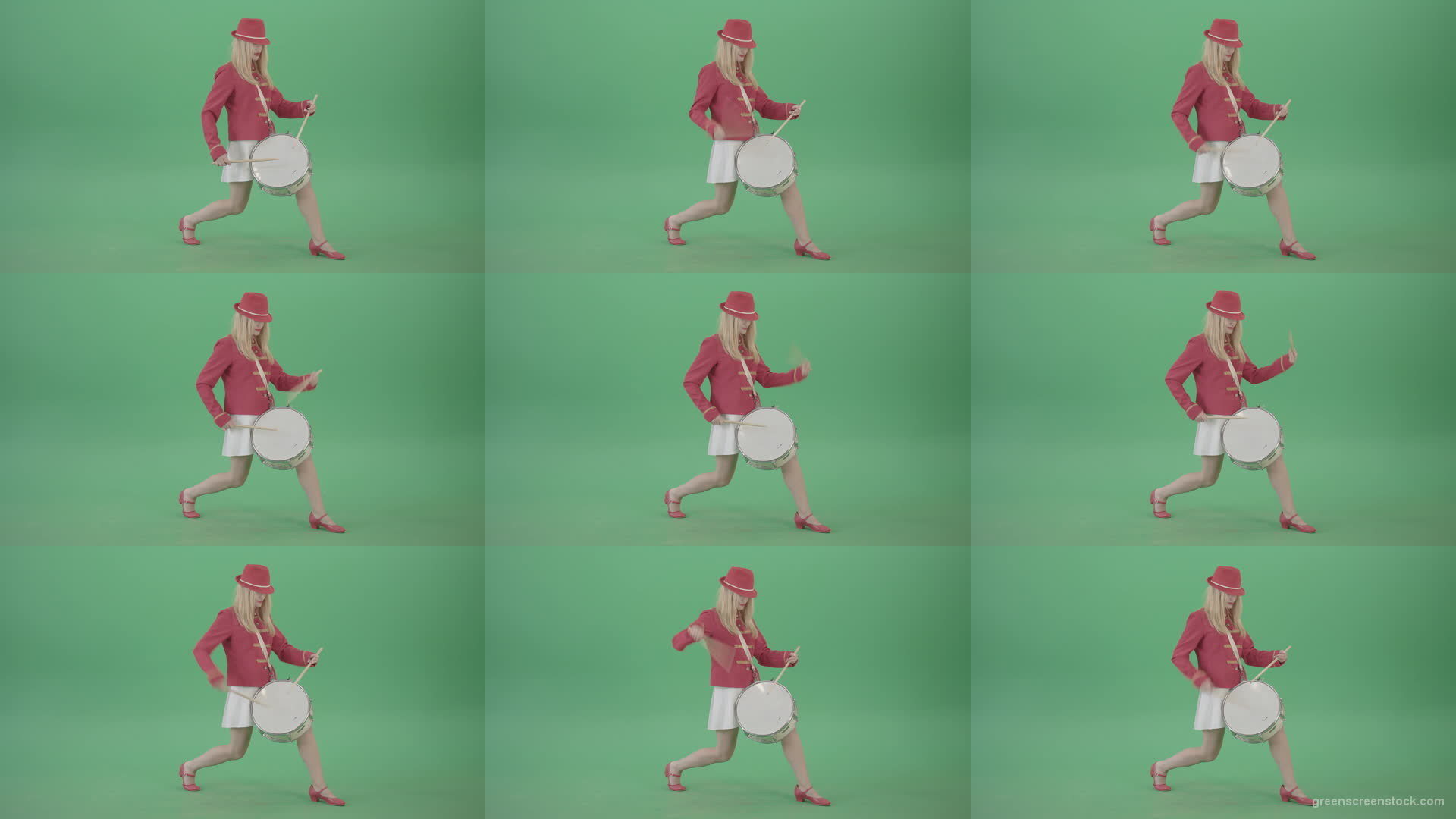 Blonde-Girl-in-Red-Uniform-making-beats-on-music-drum-instrument-in-active-pose-on-green-screen-4K-Video-Footage-1920 Green Screen Stock
