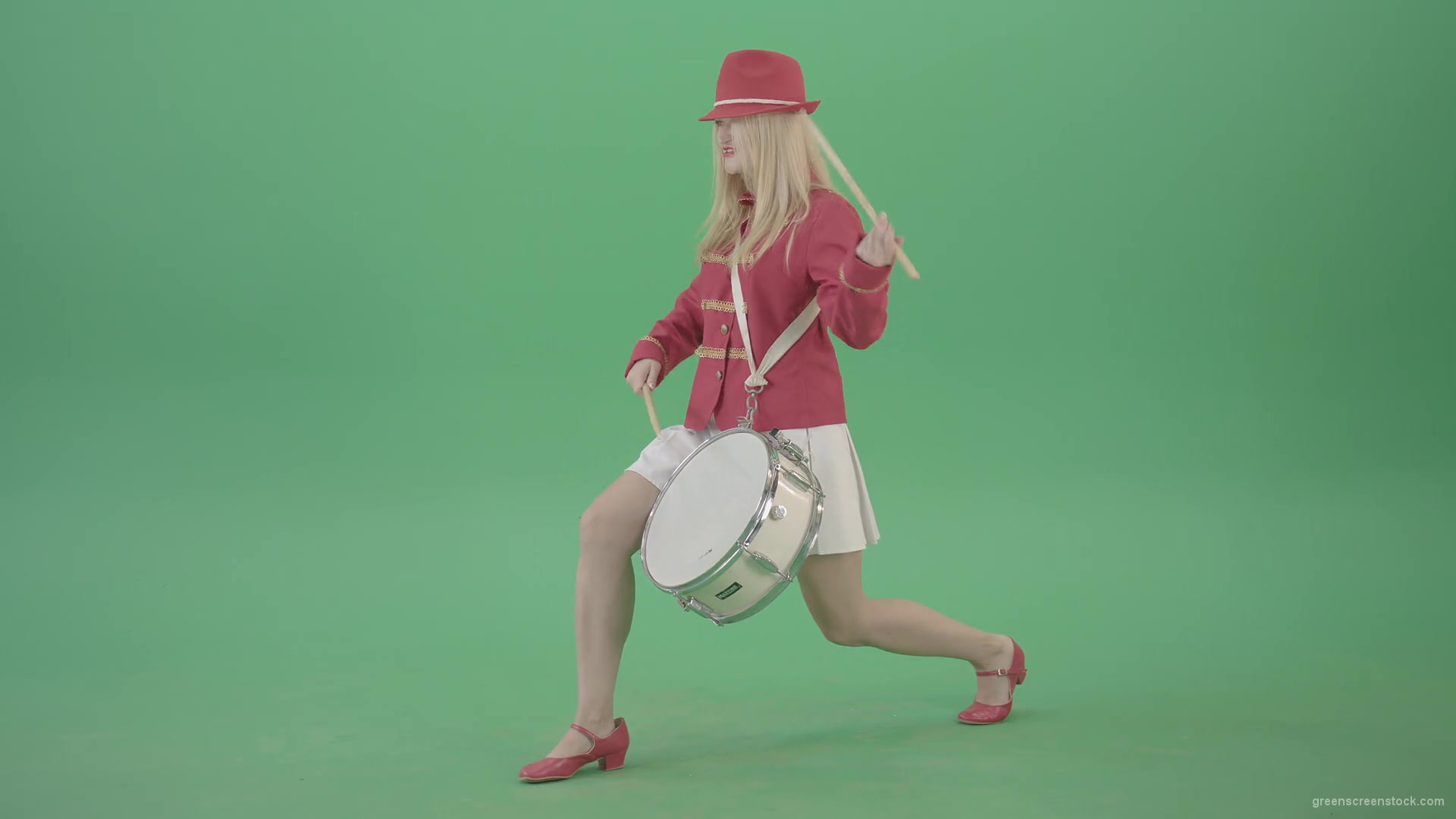 Blondie-is-ready-for-adventure-making-beats-on-snare-drum-isolated-on-Green-Screen-4K-Video-Footage-1920_002 Green Screen Stock