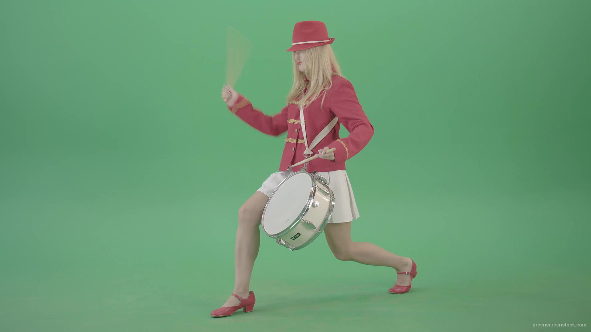 Blondie-is-ready-for-adventure-making-beats-on-snare-drum-isolated-on-Green-Screen-4K-Video-Footage-1920_007 Green Screen Stock