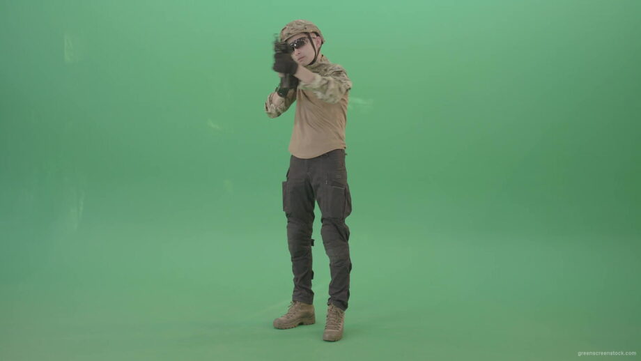 vj video background Boy-in-military-uniform-shooting-with-gun-machine-on-virtual-was-over-green-screen-4K-Video-Footage-1920_003