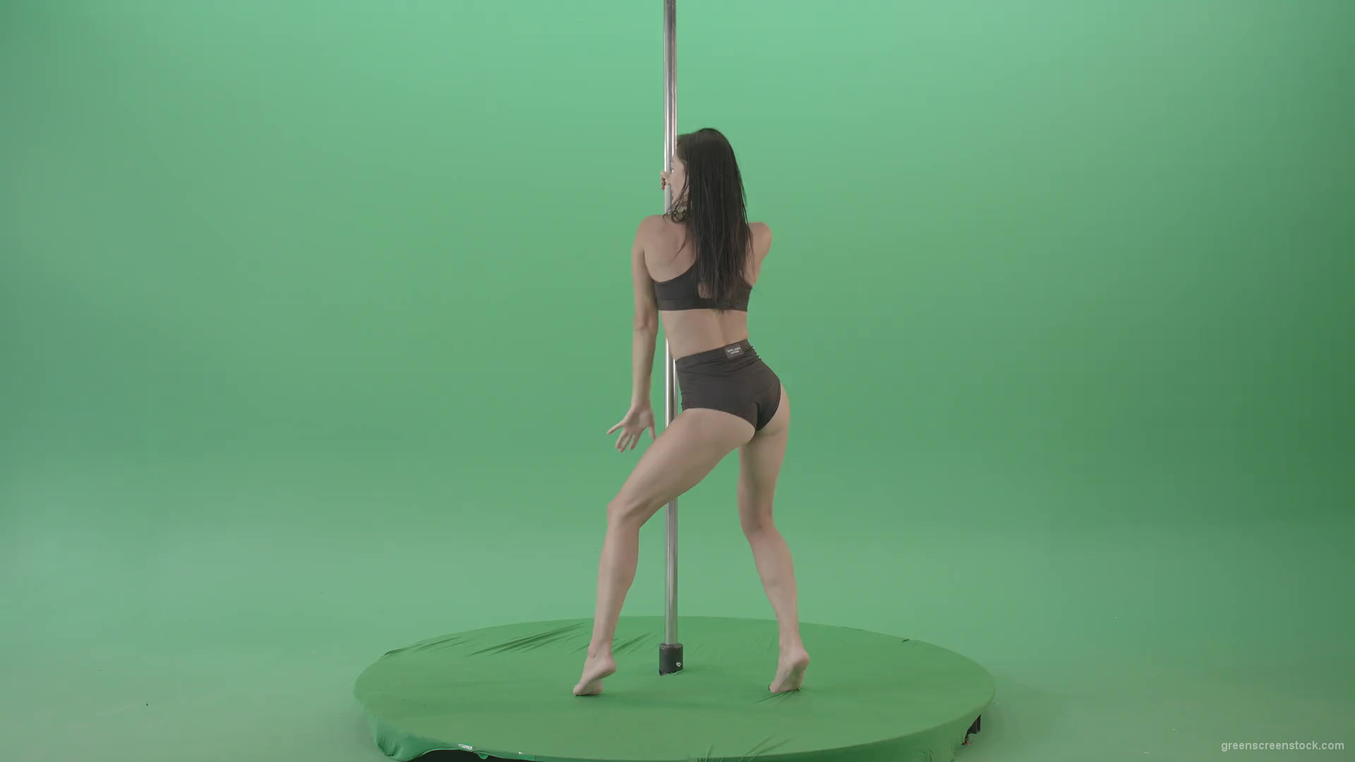 Brunette-Strip-Model-Girl-has-fun-on-dancing-pole-isolated-on-Green-Screen-4K-Video-Footage-1920_001 Green Screen Stock