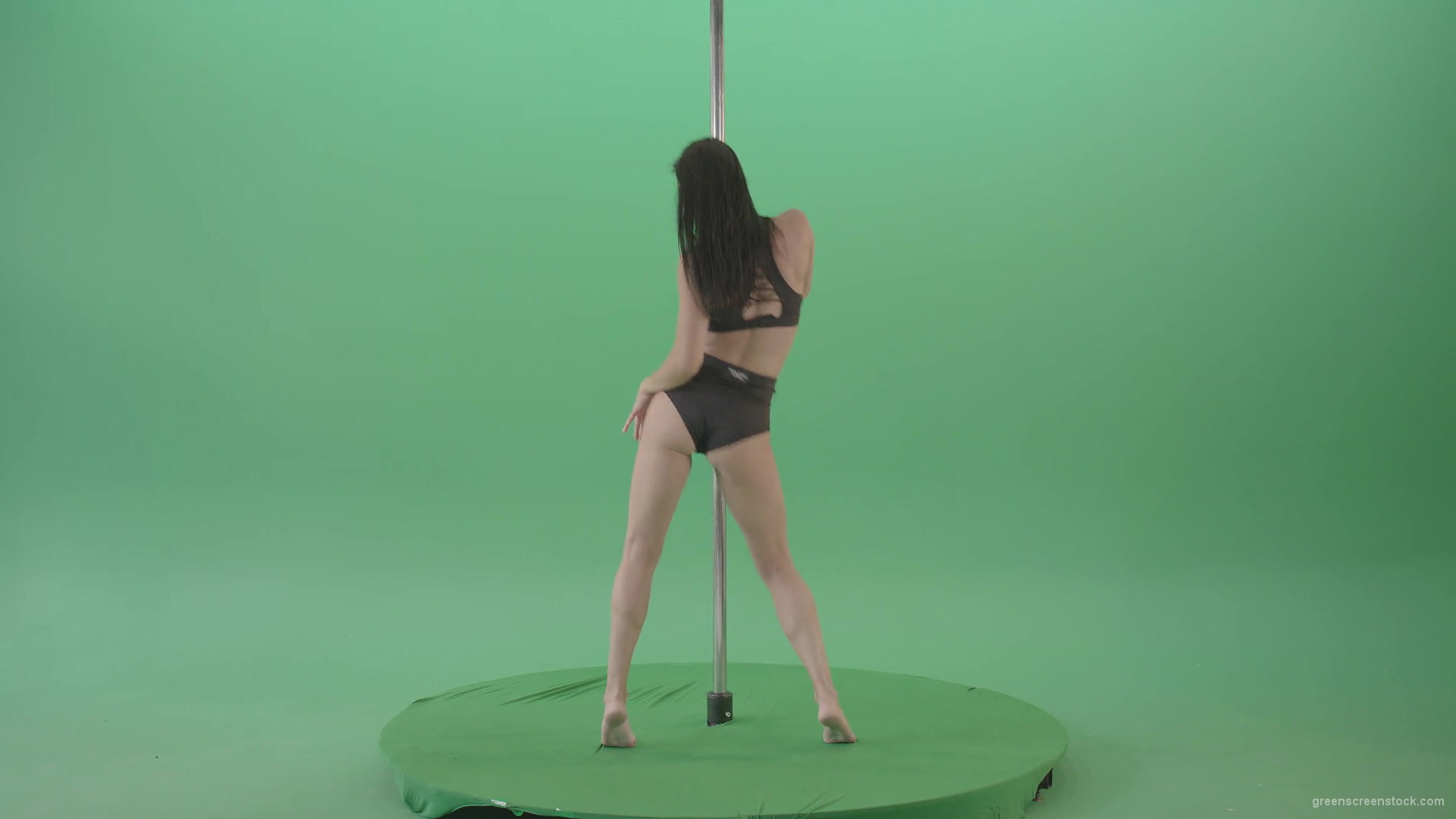 Brunette Strip Model Girl has fun on dancing pole isolated on Green Screen  - 4K Video Footage — Green Screen Stock