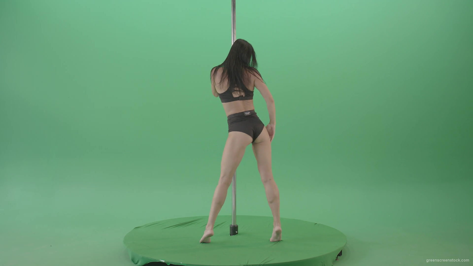 Brunette-Strip-Model-Girl-has-fun-on-dancing-pole-isolated-on-Green-Screen-4K-Video-Footage-1920_005 Green Screen Stock