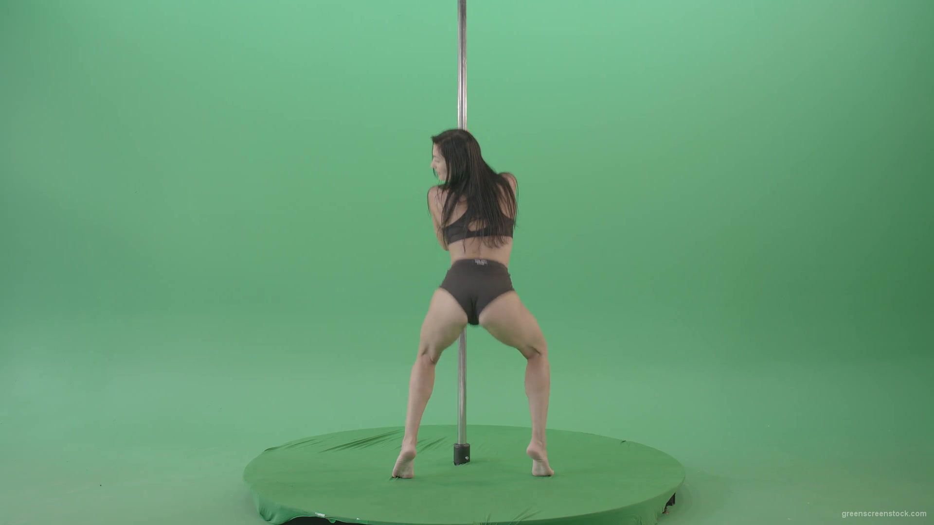 Brunette-Strip-Model-Girl-has-fun-on-dancing-pole-isolated-on-Green-Screen-4K-Video-Footage-1920_007 Green Screen Stock