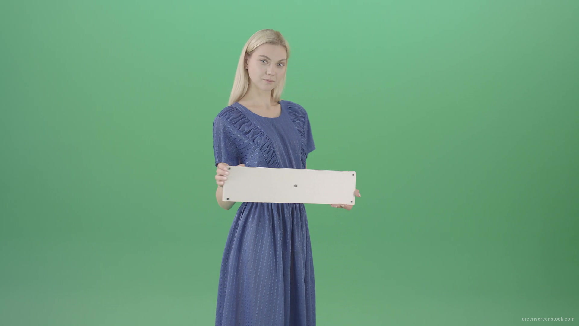 Elegant-Woman-in-blue-dress-posing-with-advertisment-text-plane-mockup-and-posing-isolated-on-Green-Screen-4K-Video-Footage-1920_008 Green Screen Stock