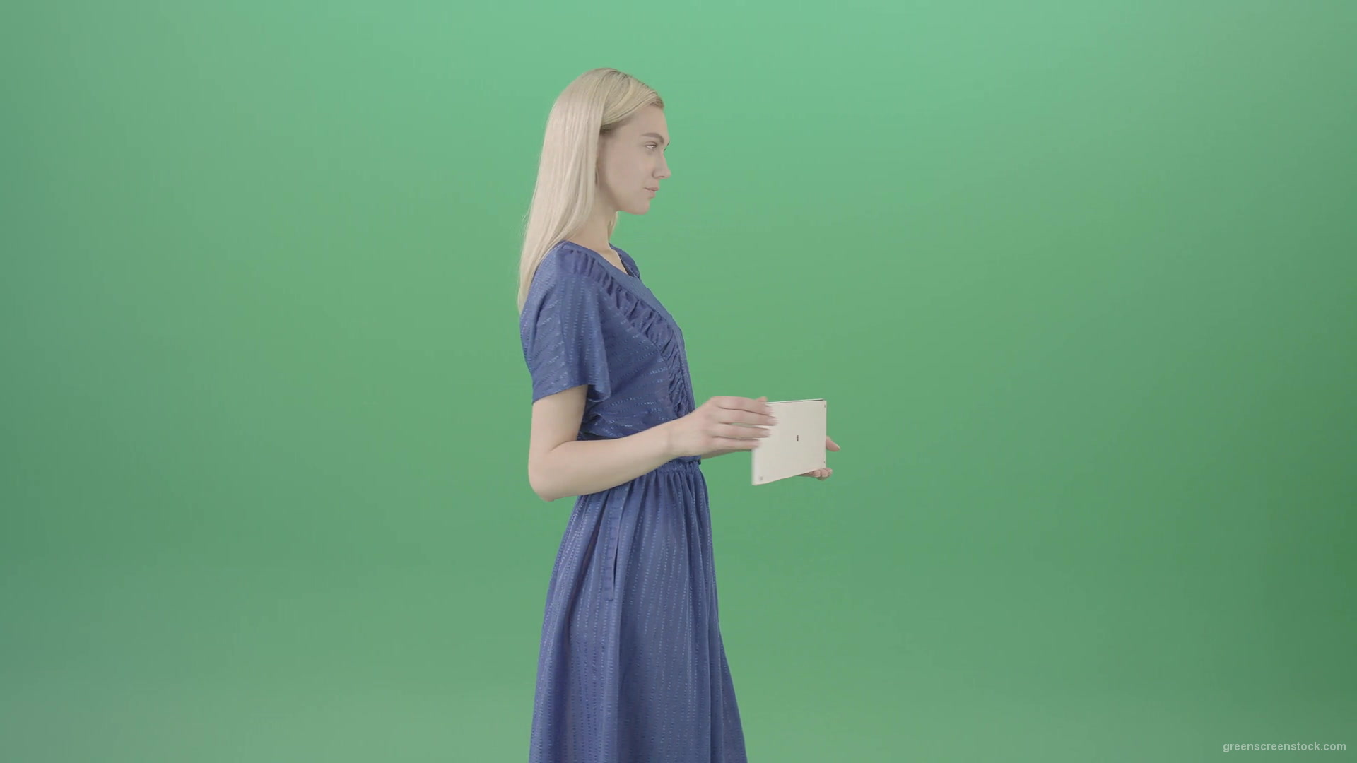 Elegant-Woman-in-blue-dress-posing-with-advertisment-text-plane-mockup-and-posing-isolated-on-Green-Screen-4K-Video-Footage-1920_009 Green Screen Stock