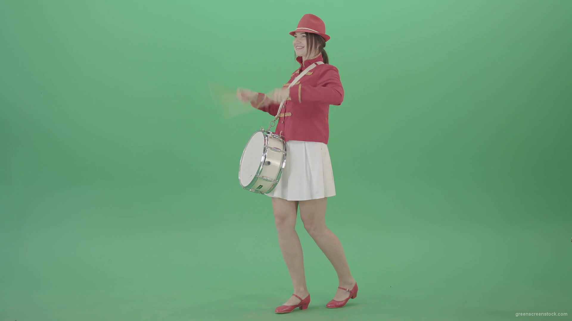 Funny-Girl-in-red-white-uniform-makes-percussion-and-play-drums-isolated-on-green-screen-4K-Video-Footage-1920_009 Green Screen Stock