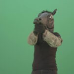 vj video background Funny-Horse-Man-in-Mask-shooting-enemies-isolated-on-green-screen-4K-Video-Footage-1920_003