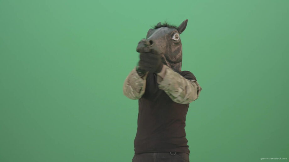 vj video background Funny-Horse-Man-in-Mask-shooting-enemies-isolated-on-green-screen-4K-Video-Footage-1920_003
