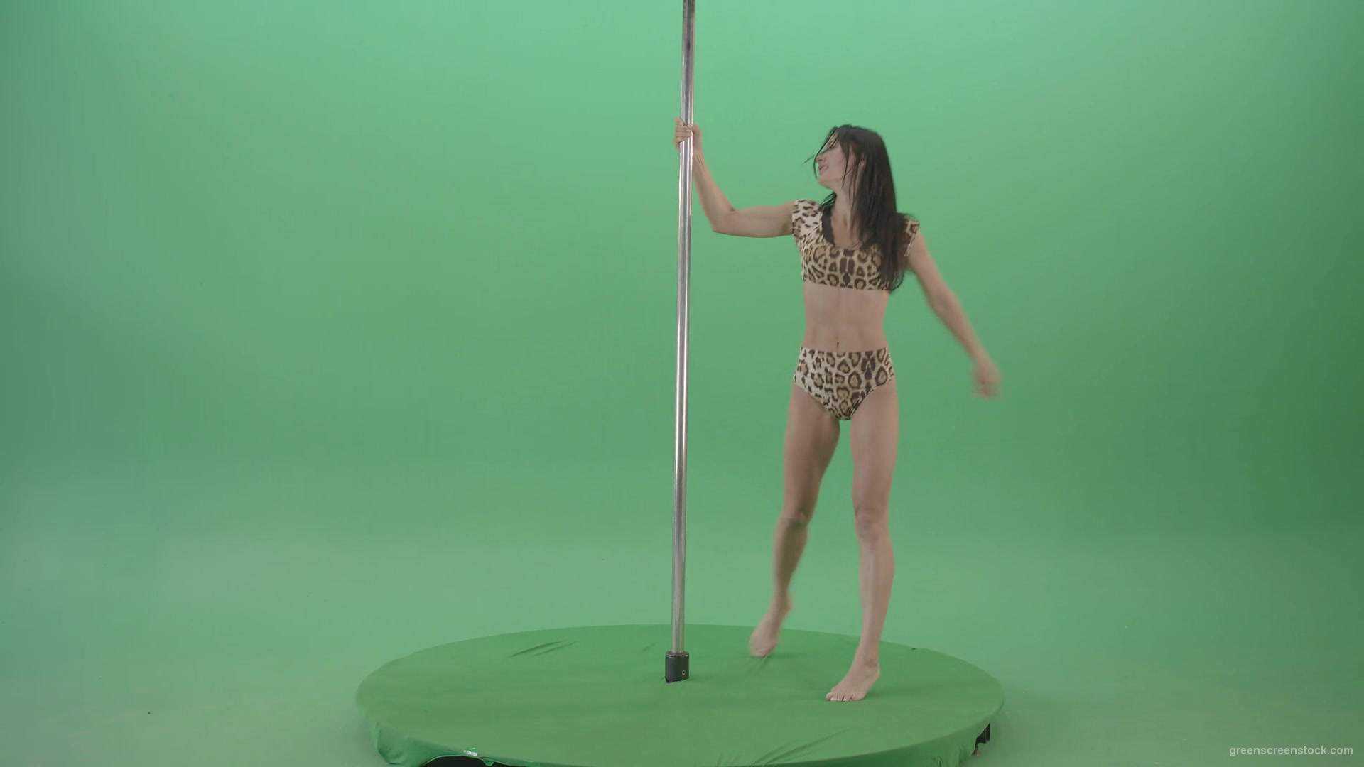 Gymnast-Girl-in-leopard-animal-underwear-spinning-fast-in-pole-dance-isolated-on-Green-Screen-4K-Video-Footage-1920_002 Green Screen Stock