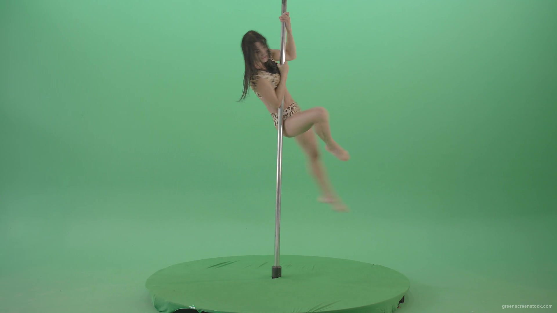 vj video background Gymnast-Girl-in-leopard-animal-underwear-spinning-fast-in-pole-dance-isolated-on-Green-Screen-4K-Video-Footage-1920_003