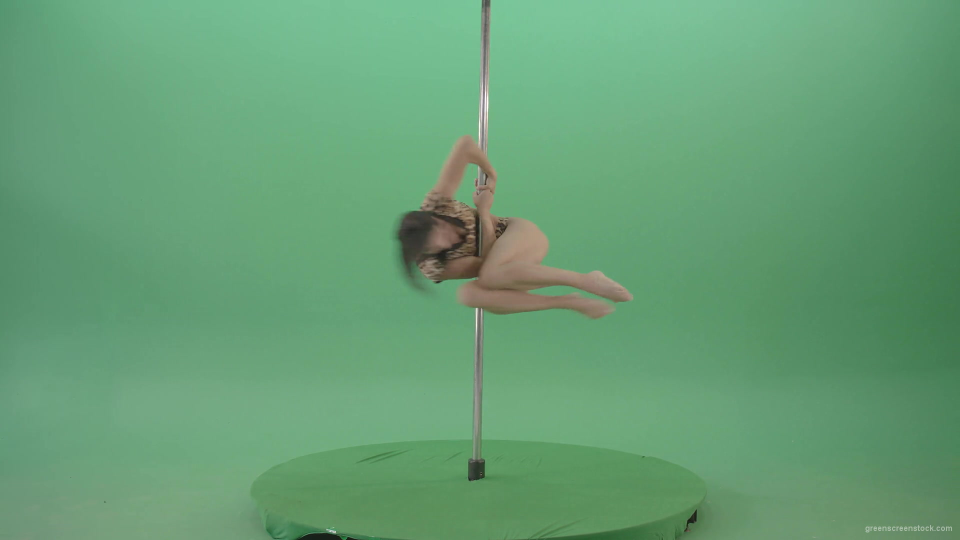 Gymnast-Girl-in-leopard-animal-underwear-spinning-fast-in-pole-dance-isolated-on-Green-Screen-4K-Video-Footage-1920_006 Green Screen Stock