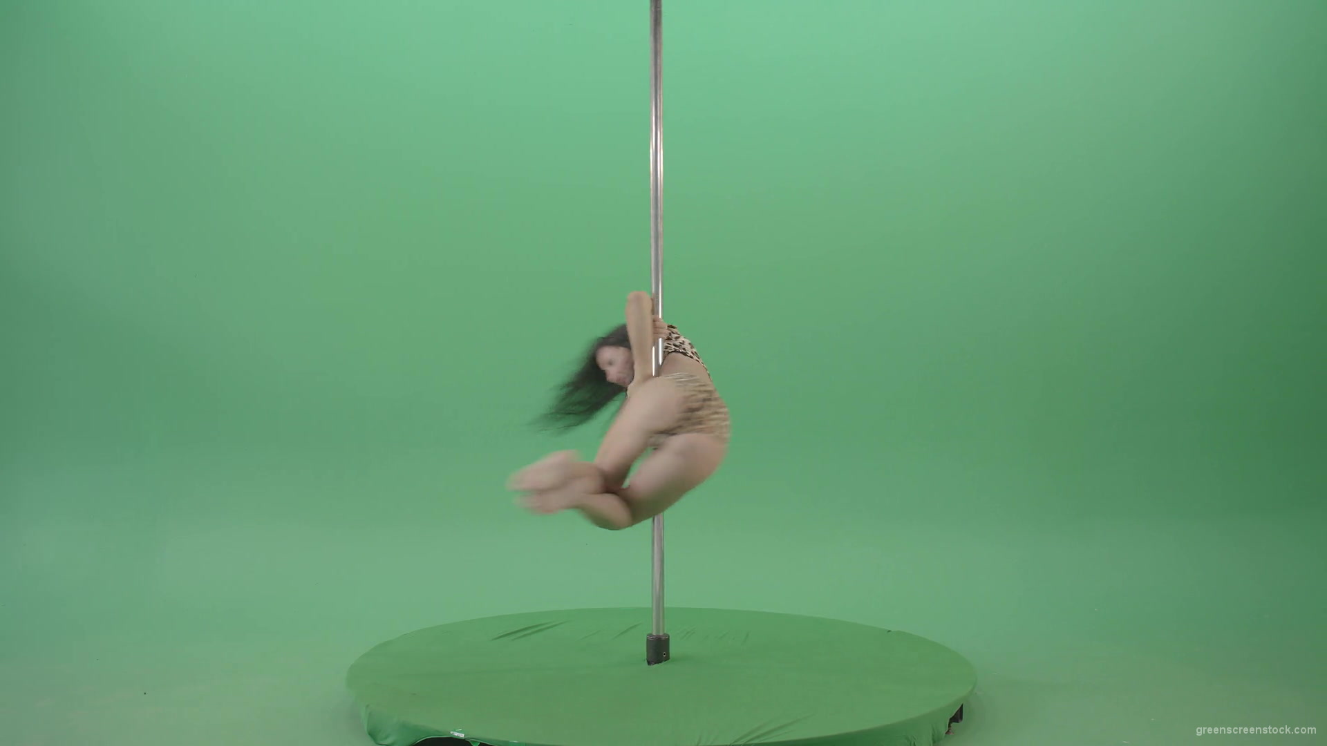 Gymnast-Girl-in-leopard-animal-underwear-spinning-fast-in-pole-dance-isolated-on-Green-Screen-4K-Video-Footage-1920_008 Green Screen Stock
