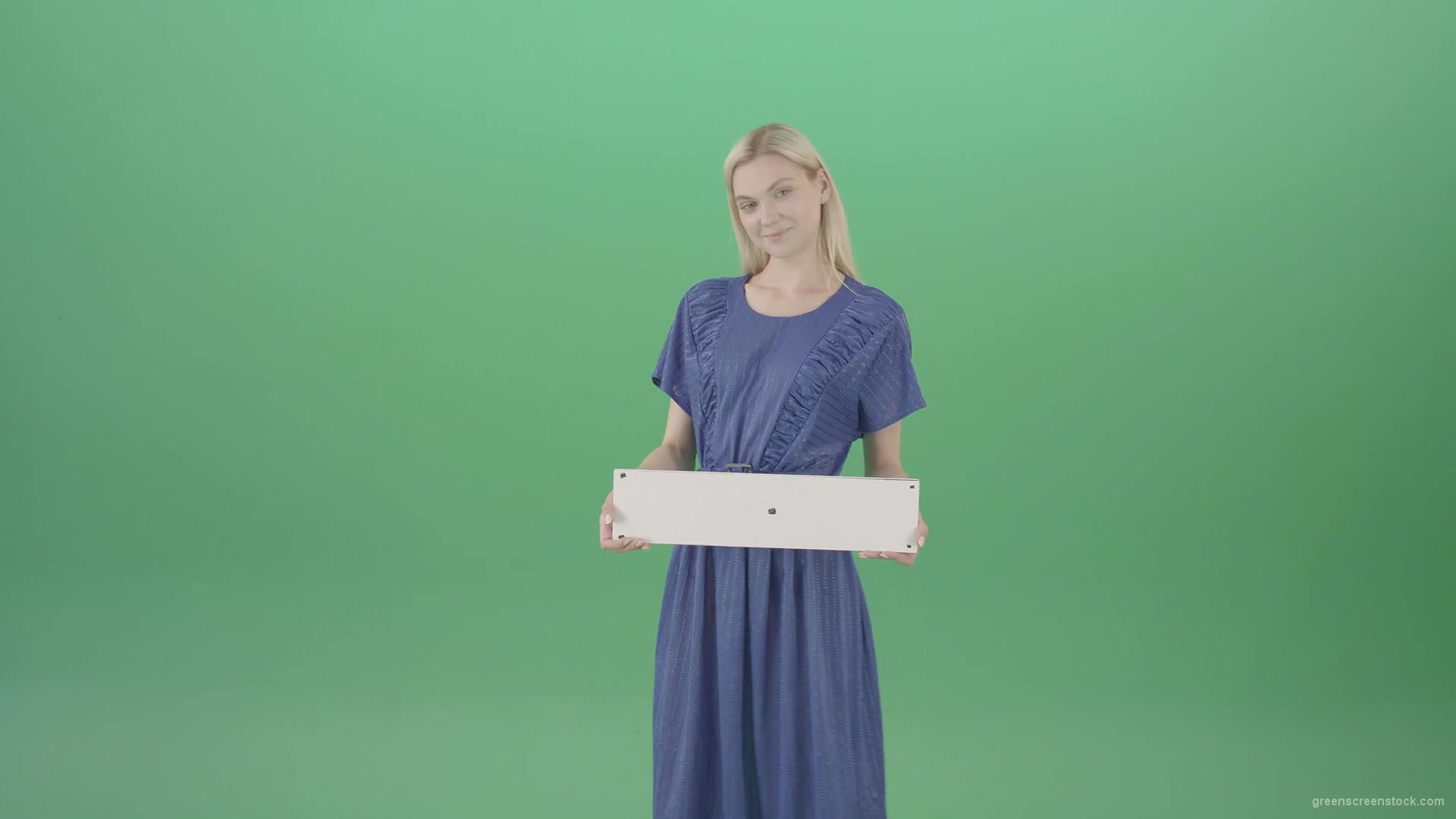 Housewife-in-blue-dress-and-with-text-plane-mockup-posing-isolated-on-Green-Screen-4K-Video-Footage-1-1920_005 Green Screen Stock