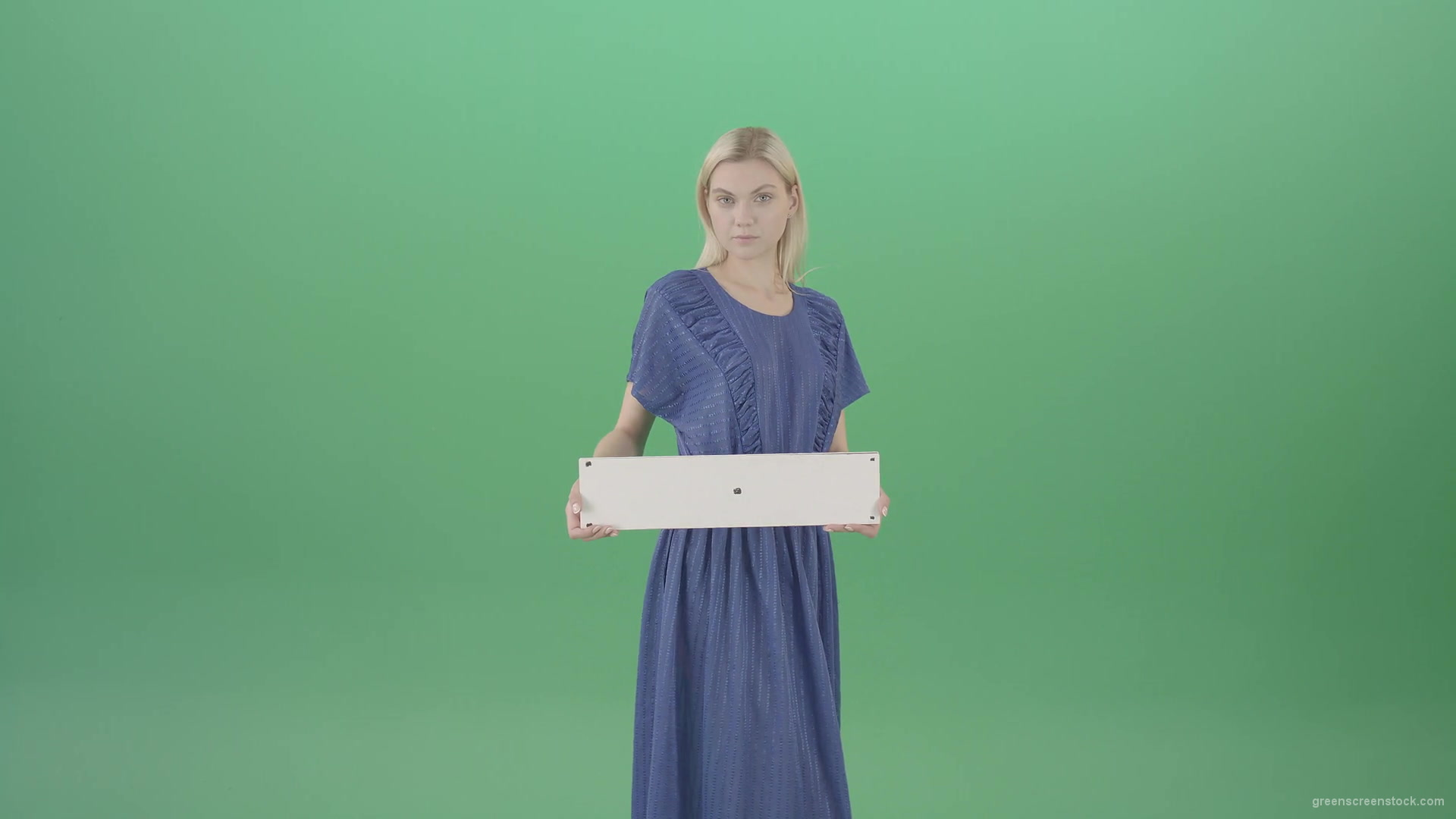 Housewife-in-blue-dress-and-with-text-plane-mockup-posing-isolated-on-Green-Screen-4K-Video-Footage-1-1920_009 Green Screen Stock
