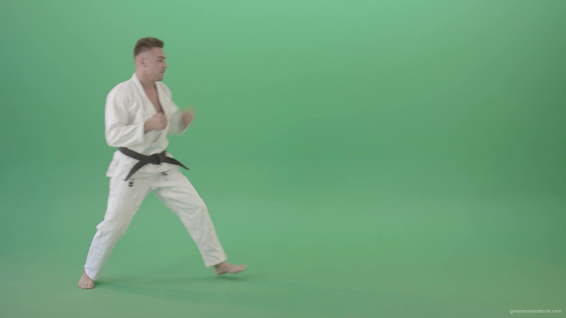 Ju-jutsu-young-man-training-slowly-karate-isolated-on-green-screen-4K-Video-Footage-1920_005 Green Screen Stock