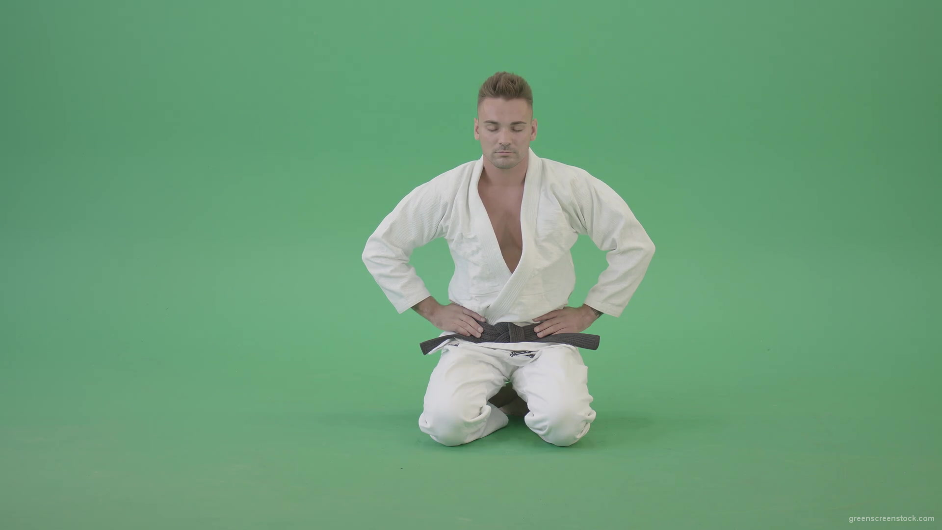 Jujutsu-Sport-man-meditating-and-breathing-slowly-isolated-on-green-screen-4K-Video-Footage-1920_002 Green Screen Stock