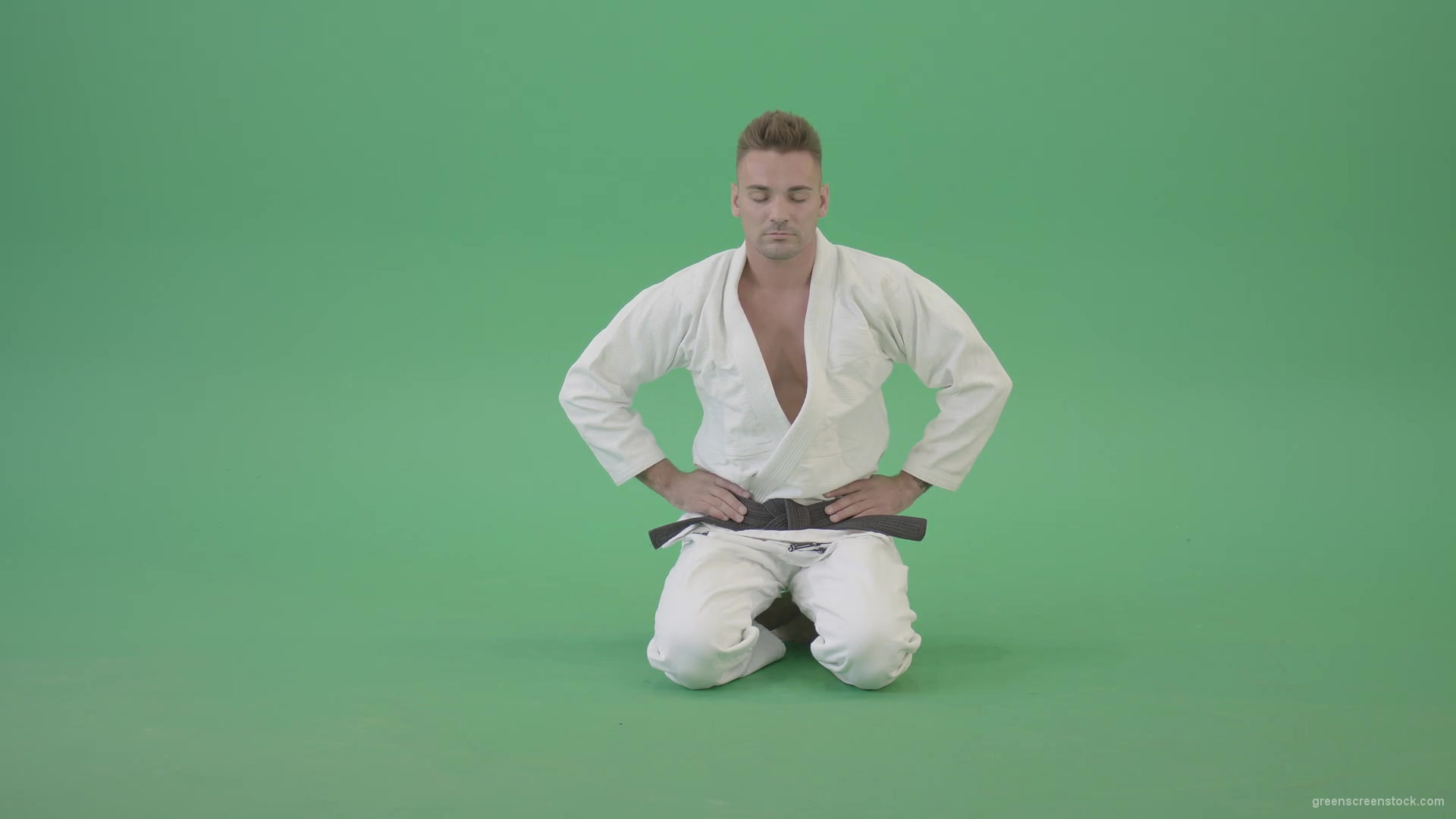 Jujutsu-Sport-man-meditating-and-breathing-slowly-isolated-on-green-screen-4K-Video-Footage-1920_004 Green Screen Stock