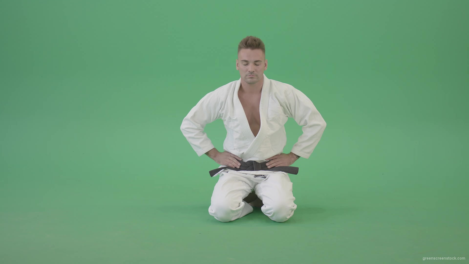 Jujutsu-Sport-man-meditating-and-breathing-slowly-isolated-on-green-screen-4K-Video-Footage-1920_005 Green Screen Stock