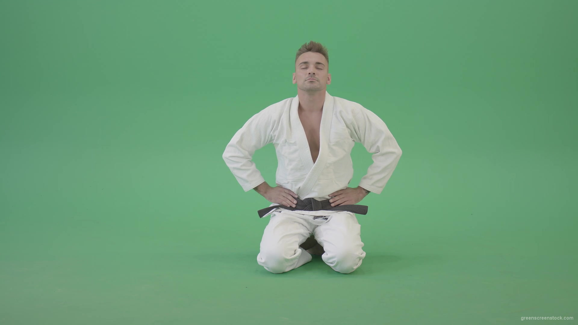 Jujutsu-Sport-man-meditating-and-breathing-slowly-isolated-on-green-screen-4K-Video-Footage-1920_006 Green Screen Stock