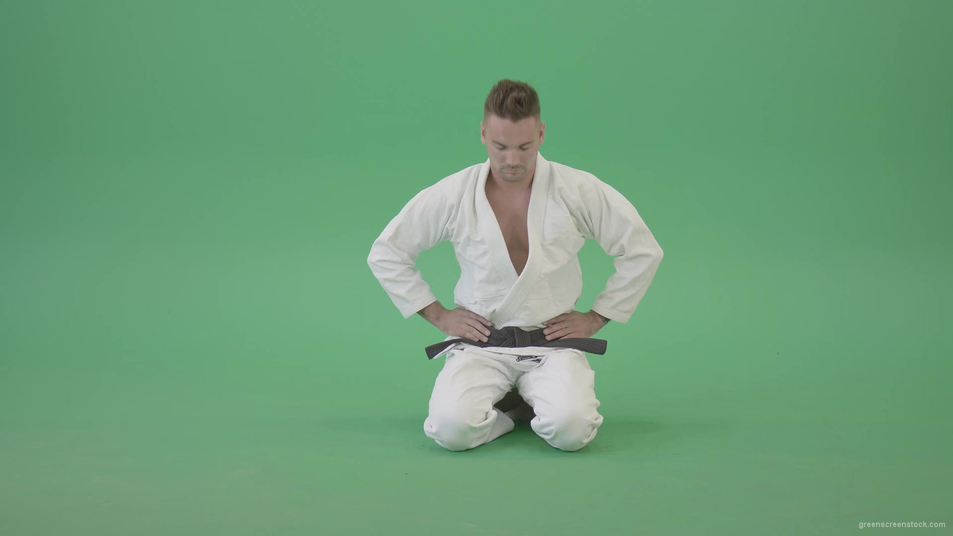 Jujutsu-Sport-man-meditating-and-breathing-slowly-isolated-on-green-screen-4K-Video-Footage-1920_008 Green Screen Stock
