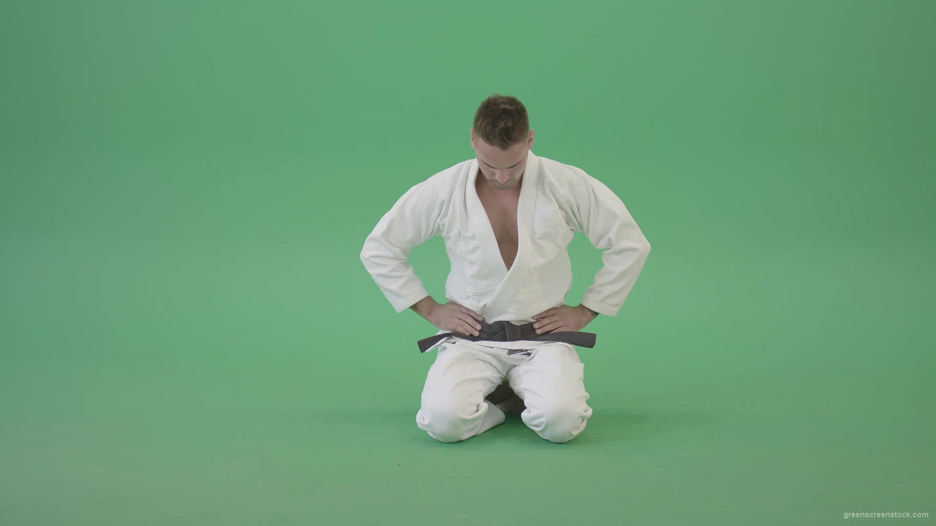 Jujutsu-Sport-man-meditating-and-breathing-slowly-isolated-on-green-screen-4K-Video-Footage-1920_009 Green Screen Stock