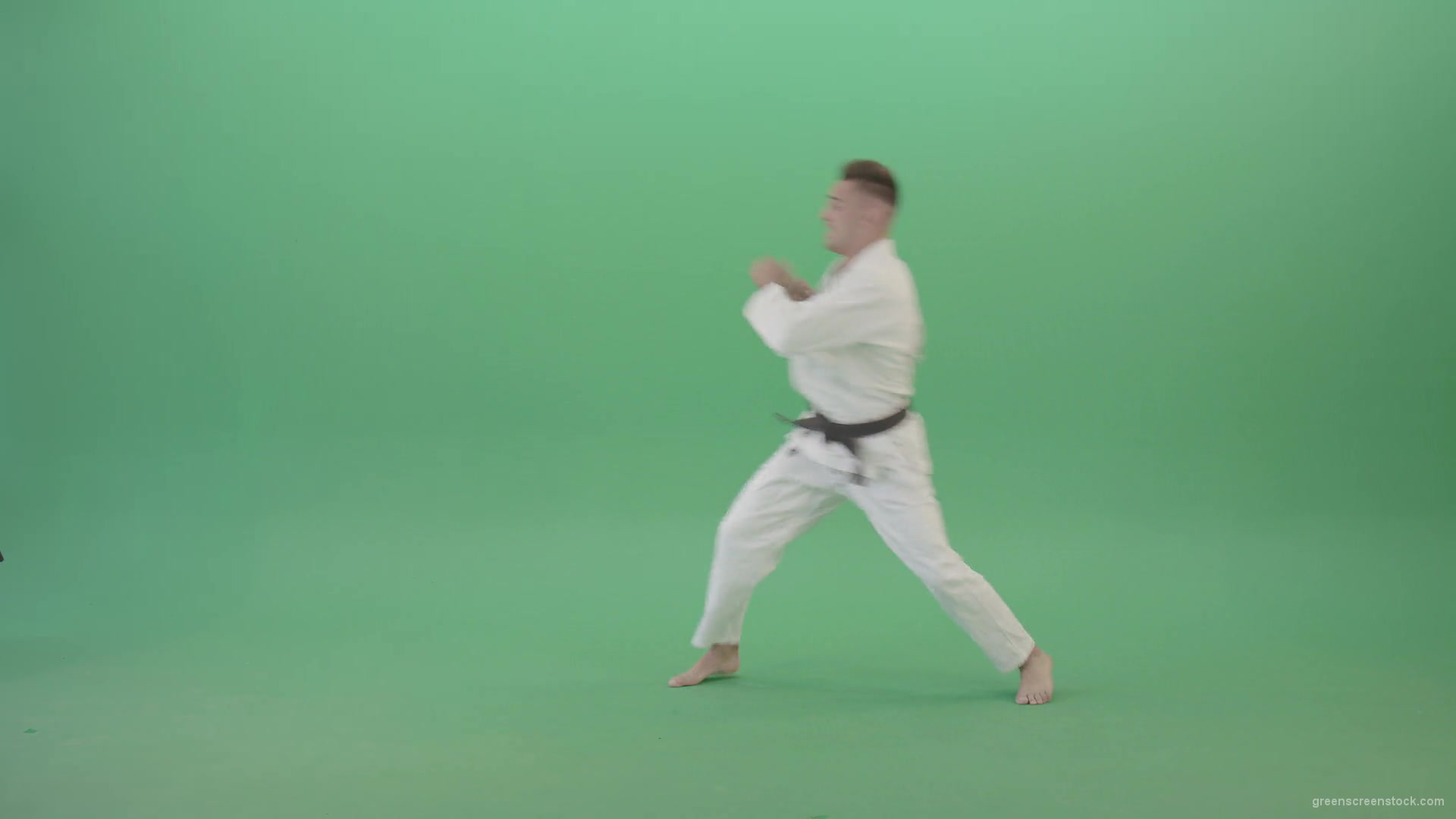 Karate-Sport-man-make-side-kick-isolated-on-green-screen-4K-Video-Footage-1920_004 Green Screen Stock