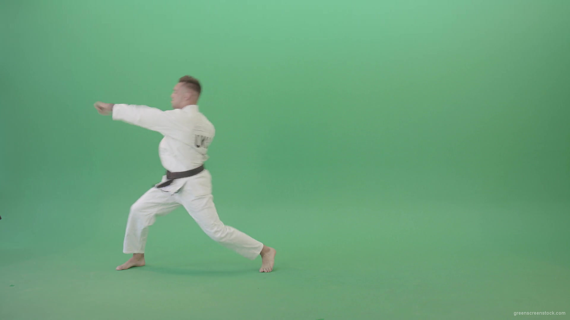 Karate-Sport-man-make-side-kick-isolated-on-green-screen-4K-Video-Footage-1920_006 Green Screen Stock