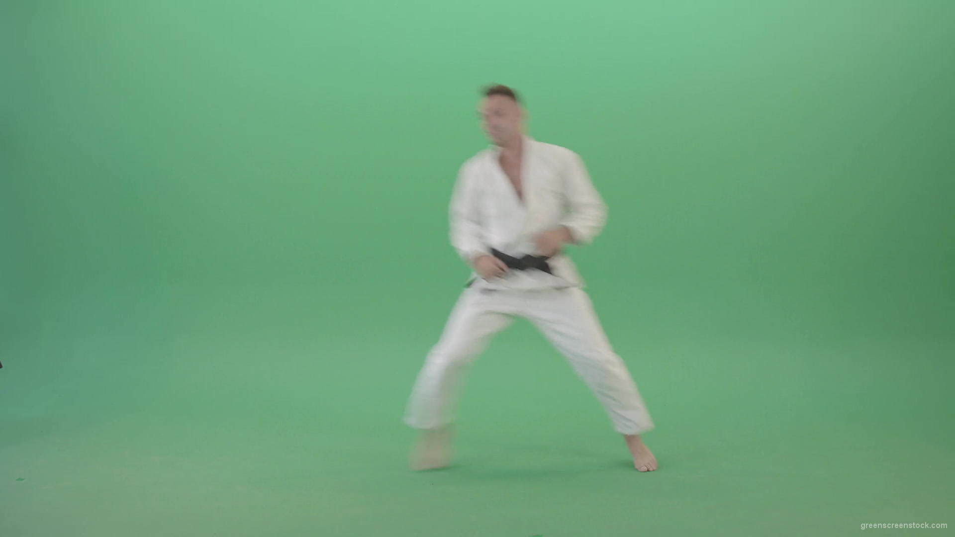 Karate-Sport-man-make-side-kick-isolated-on-green-screen-4K-Video-Footage-1920_008 Green Screen Stock