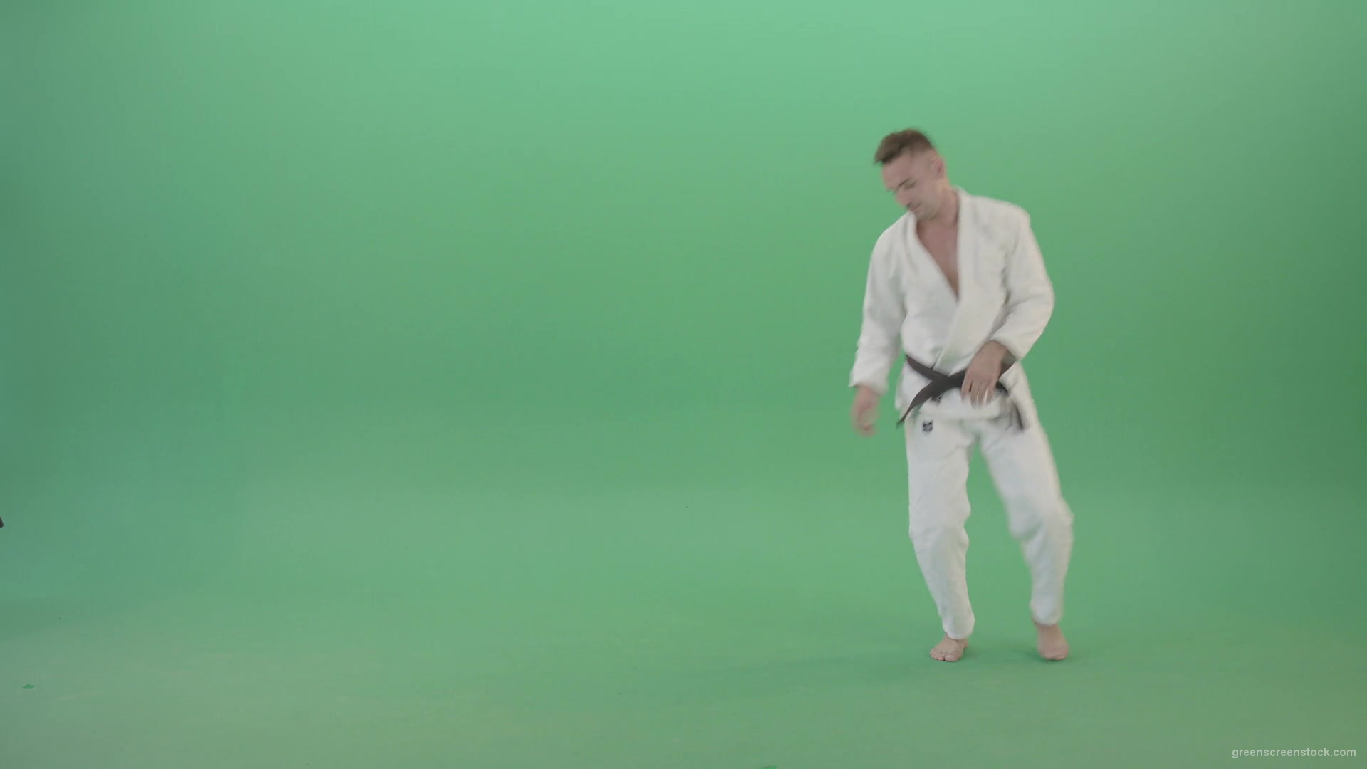 Karate-Sport-man-make-side-kick-isolated-on-green-screen-4K-Video-Footage-1920_009 Green Screen Stock