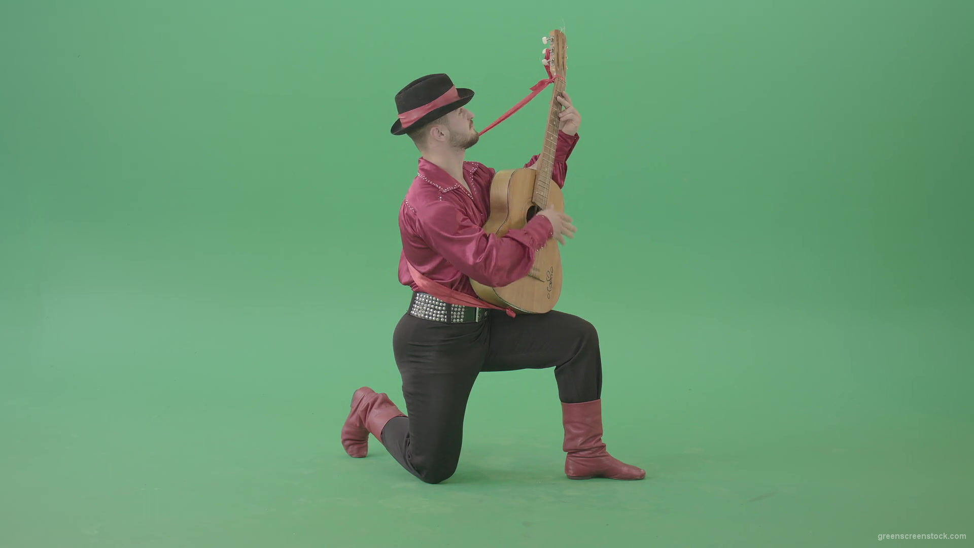 Man-in-Gipsy-costume-playing-love-song-on-guitar-isolated-on-green-screen-4K-Video-Footage-1920_004 Green Screen Stock