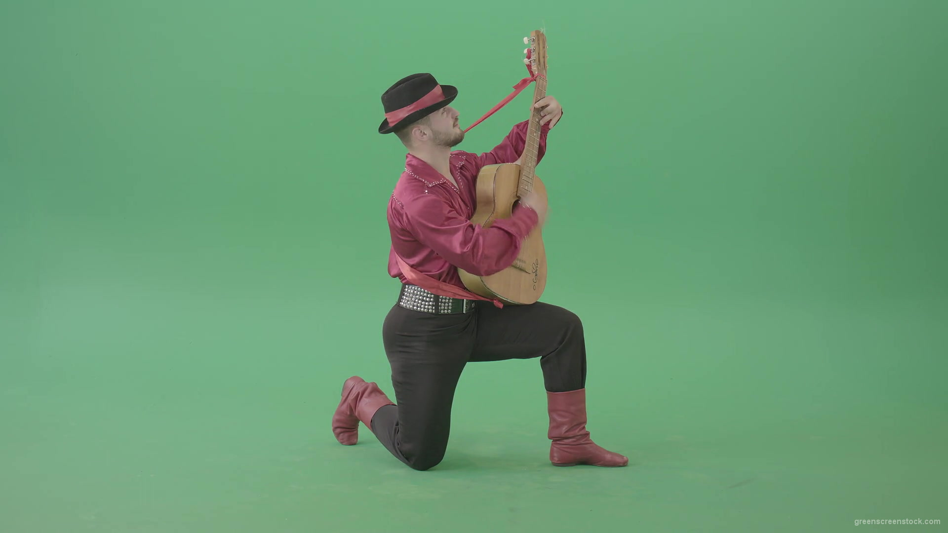 Man-in-Gipsy-costume-playing-love-song-on-guitar-isolated-on-green-screen-4K-Video-Footage-1920_005 Green Screen Stock