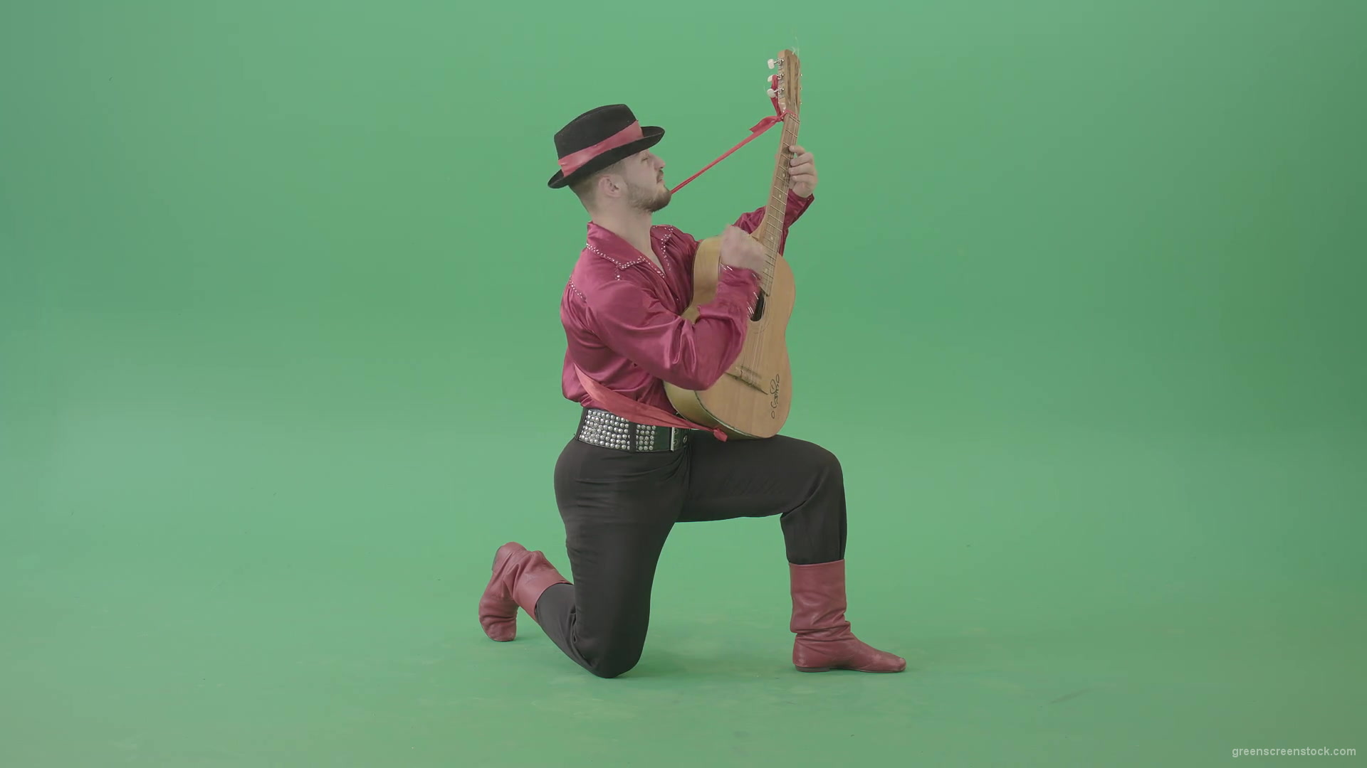 Man-in-Gipsy-costume-playing-love-song-on-guitar-isolated-on-green-screen-4K-Video-Footage-1920_006 Green Screen Stock