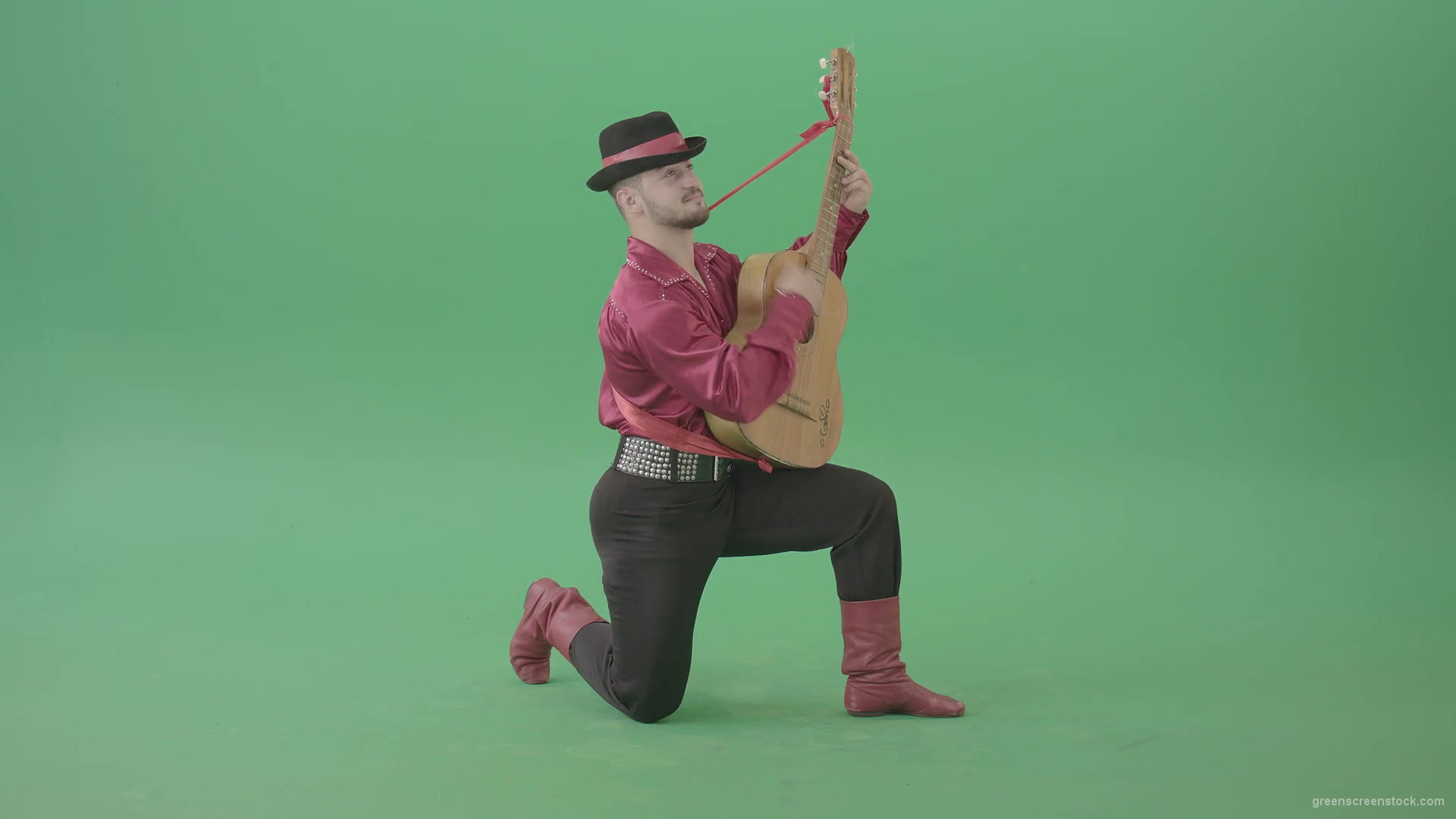 Man-in-Gipsy-costume-playing-love-song-on-guitar-isolated-on-green-screen-4K-Video-Footage-1920_007 Green Screen Stock