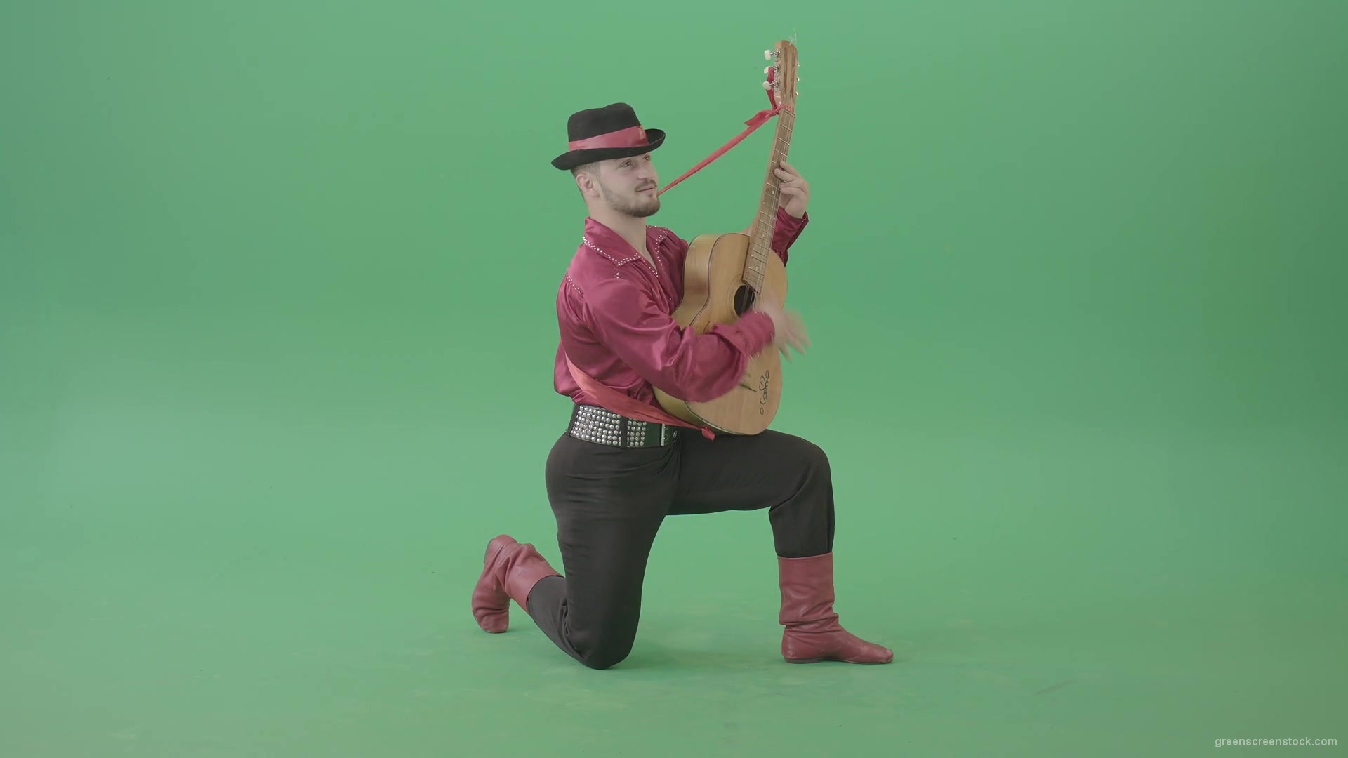Man-in-Gipsy-costume-playing-love-song-on-guitar-isolated-on-green-screen-4K-Video-Footage-1920_008 Green Screen Stock