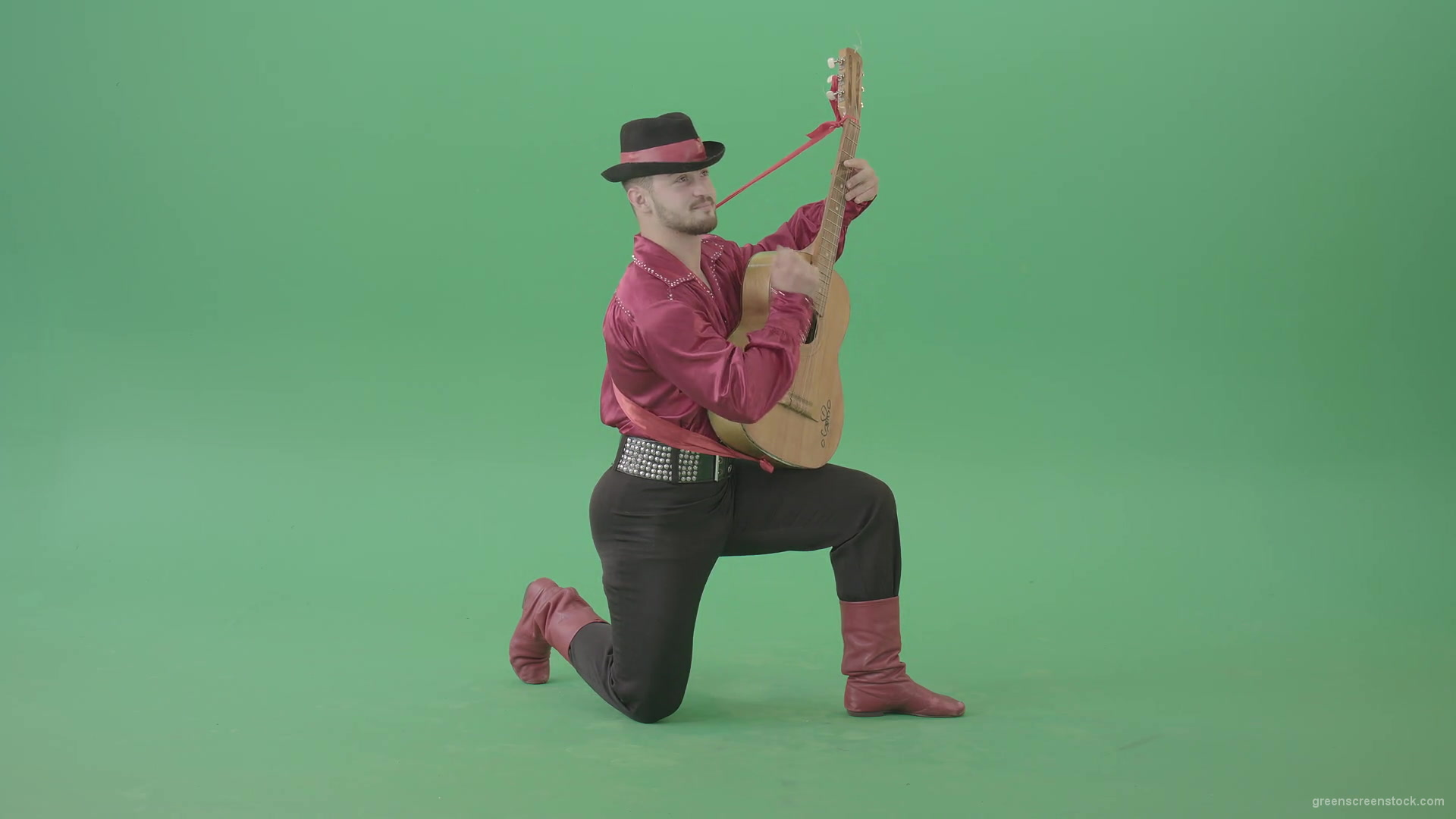 Man-in-Gipsy-costume-playing-love-song-on-guitar-isolated-on-green-screen-4K-Video-Footage-1920_009 Green Screen Stock