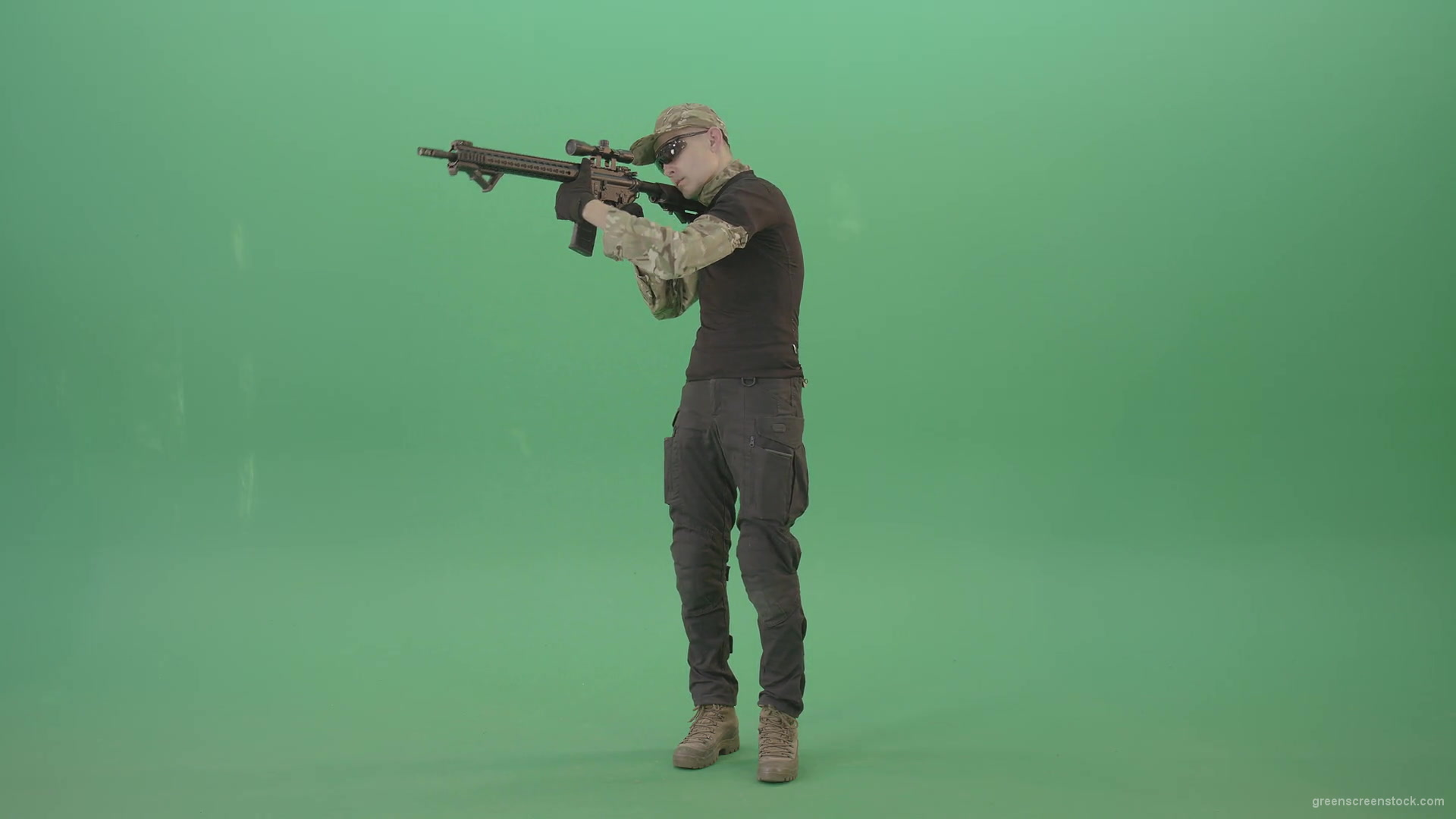 Man-in-Military-uniform-shooting-with-Army-machine-gun-isolated-on-Green-Screen-4K-Video-Footage-1920_004 Green Screen Stock