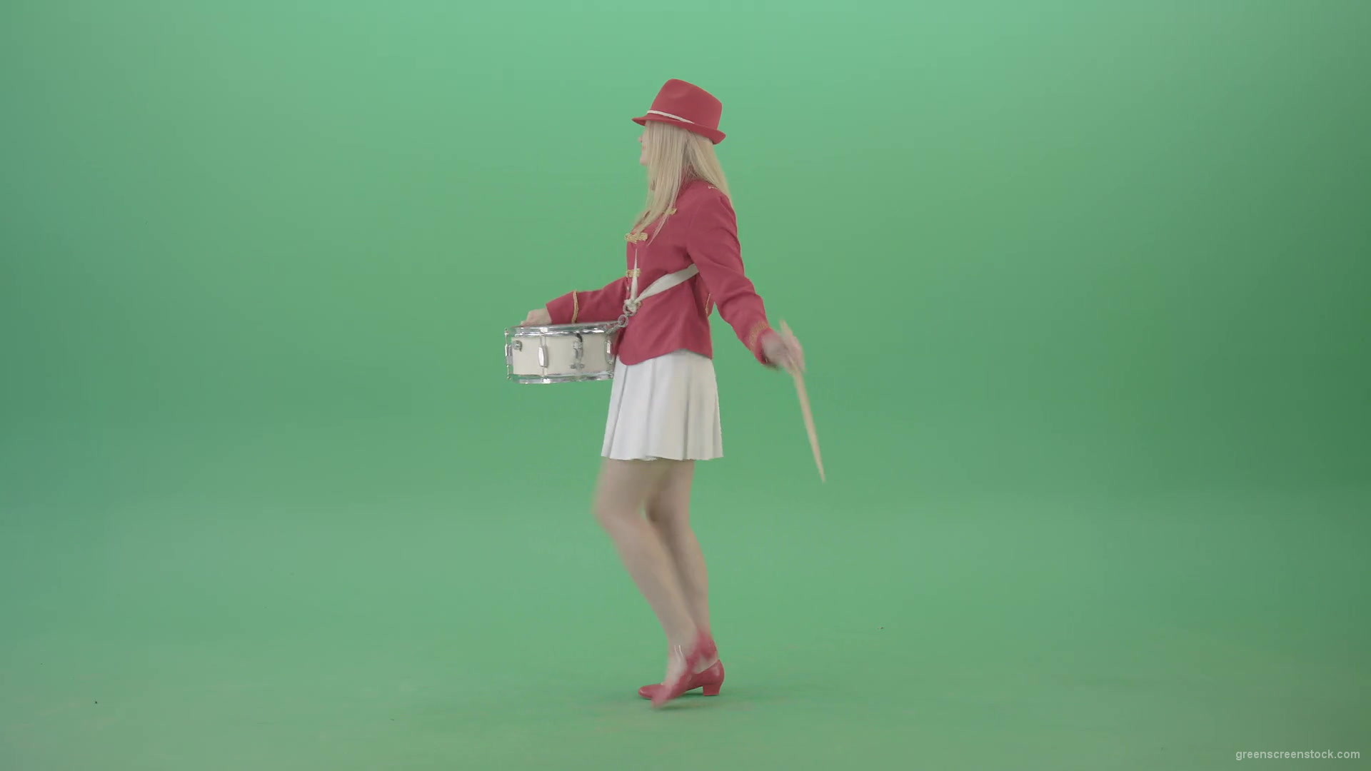 Side-view-of-blonde-girl-in-red-costume-playing-drums-isolated-on-green-screen-4K-Video-Footage-1920_002 Green Screen Stock