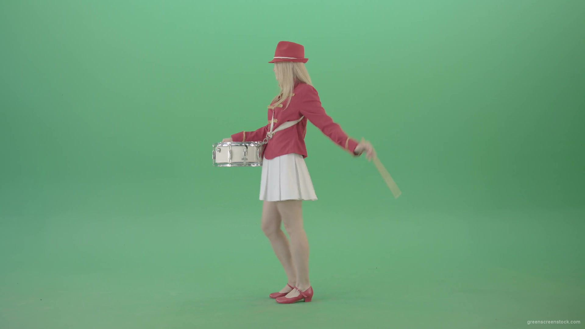 Side-view-of-blonde-girl-in-red-costume-playing-drums-isolated-on-green-screen-4K-Video-Footage-1920_004 Green Screen Stock