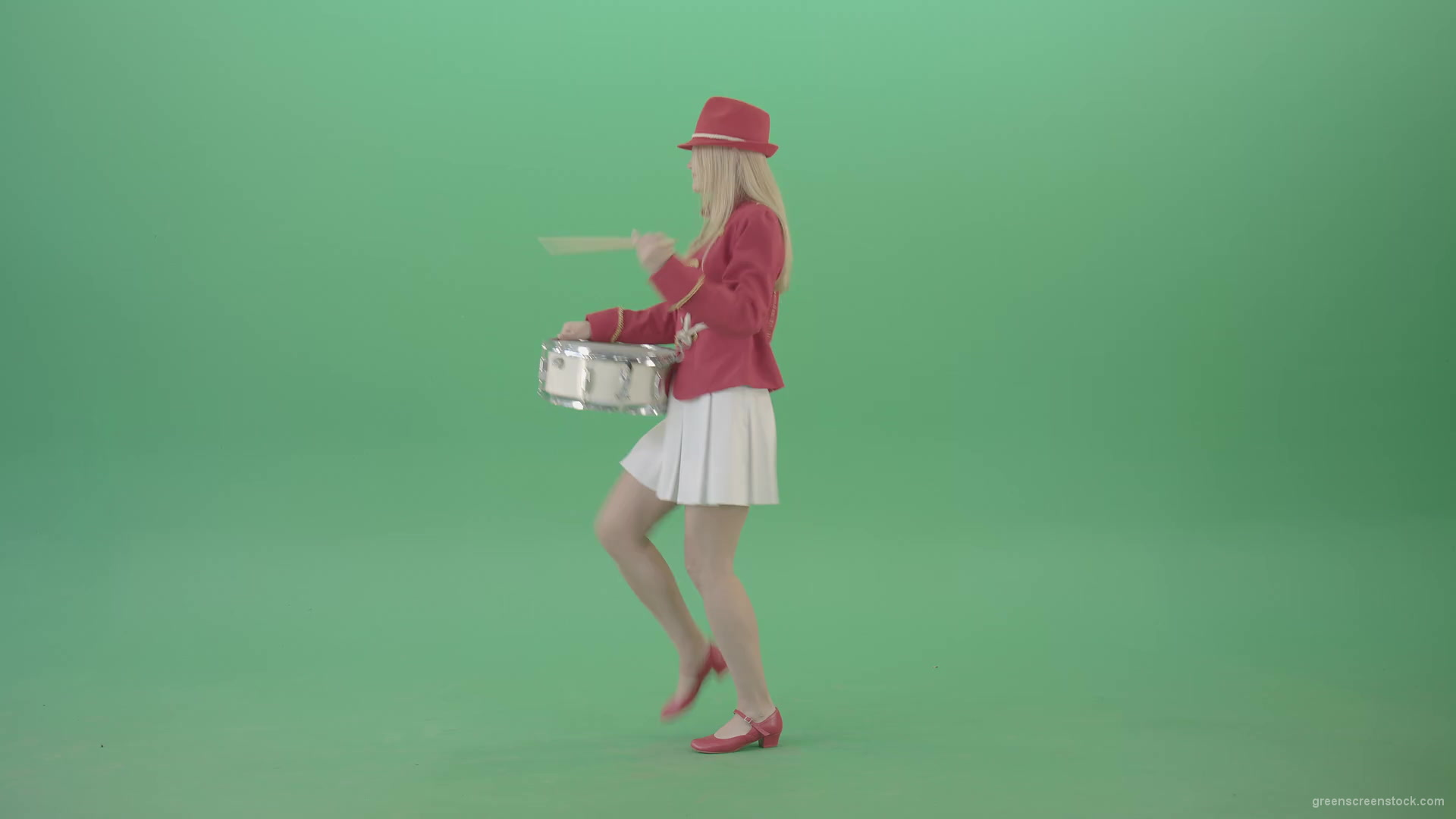 Side-view-of-blonde-girl-in-red-costume-playing-drums-isolated-on-green-screen-4K-Video-Footage-1920_008 Green Screen Stock