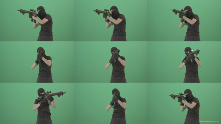 Soldier-in-black-mask-shooting-enemies-with-military-gun-on-green-screen-4K-Video-Footage-1920 Green Screen Stock