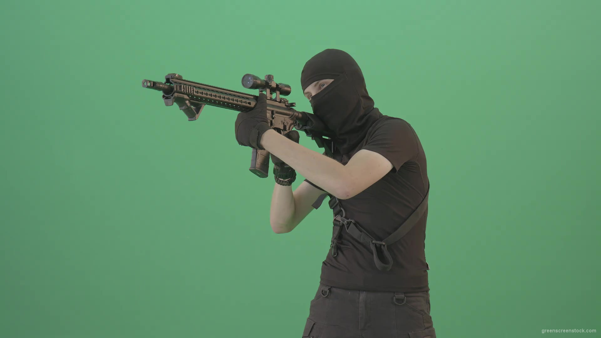 Soldier-in-black-mask-shooting-enemies-with-military-gun-on-green-screen-4K-Video-Footage-1920_001 Green Screen Stock