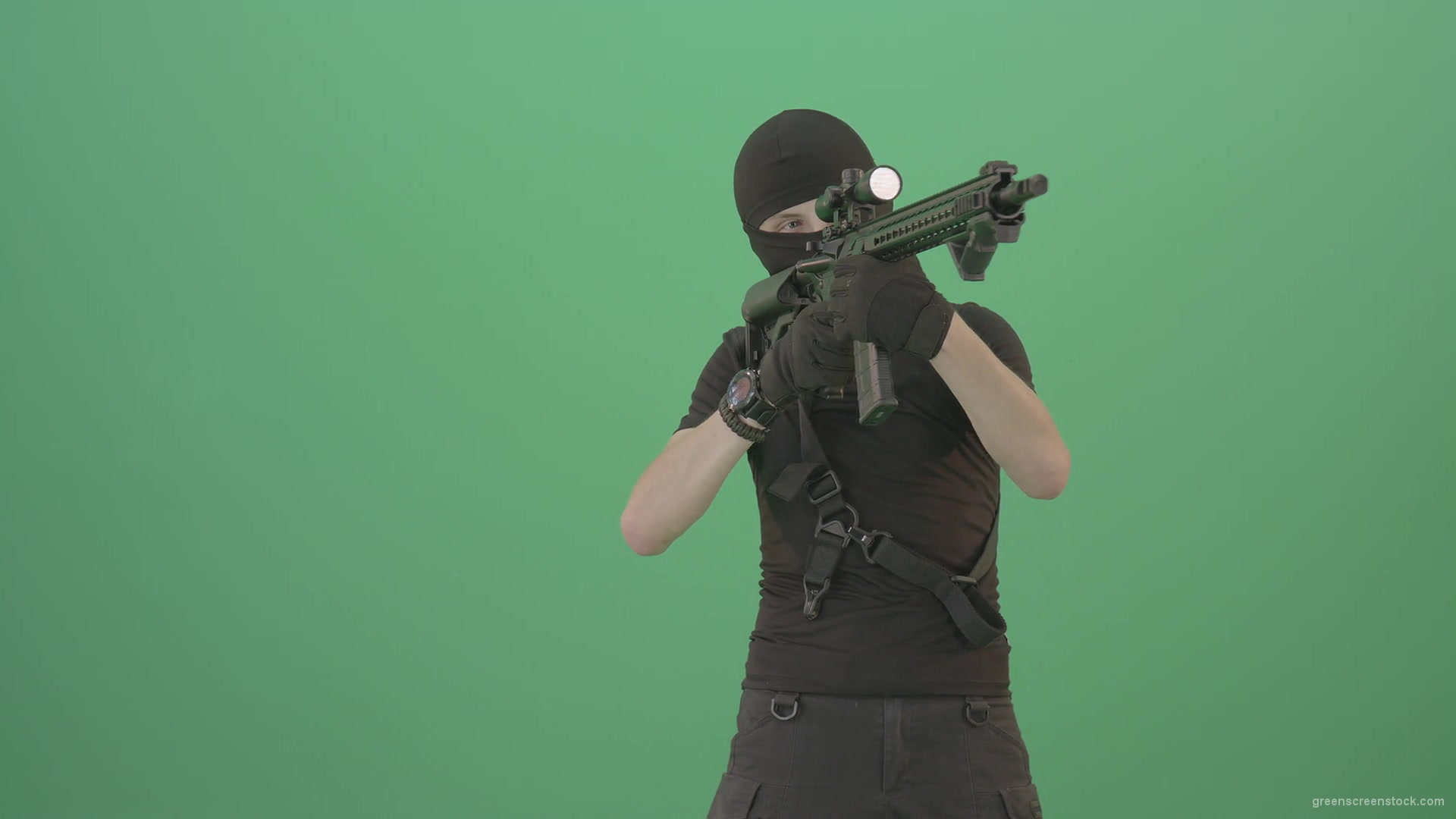 Soldier-in-black-mask-shooting-enemies-with-military-gun-on-green-screen-4K-Video-Footage-1920_006 Green Screen Stock