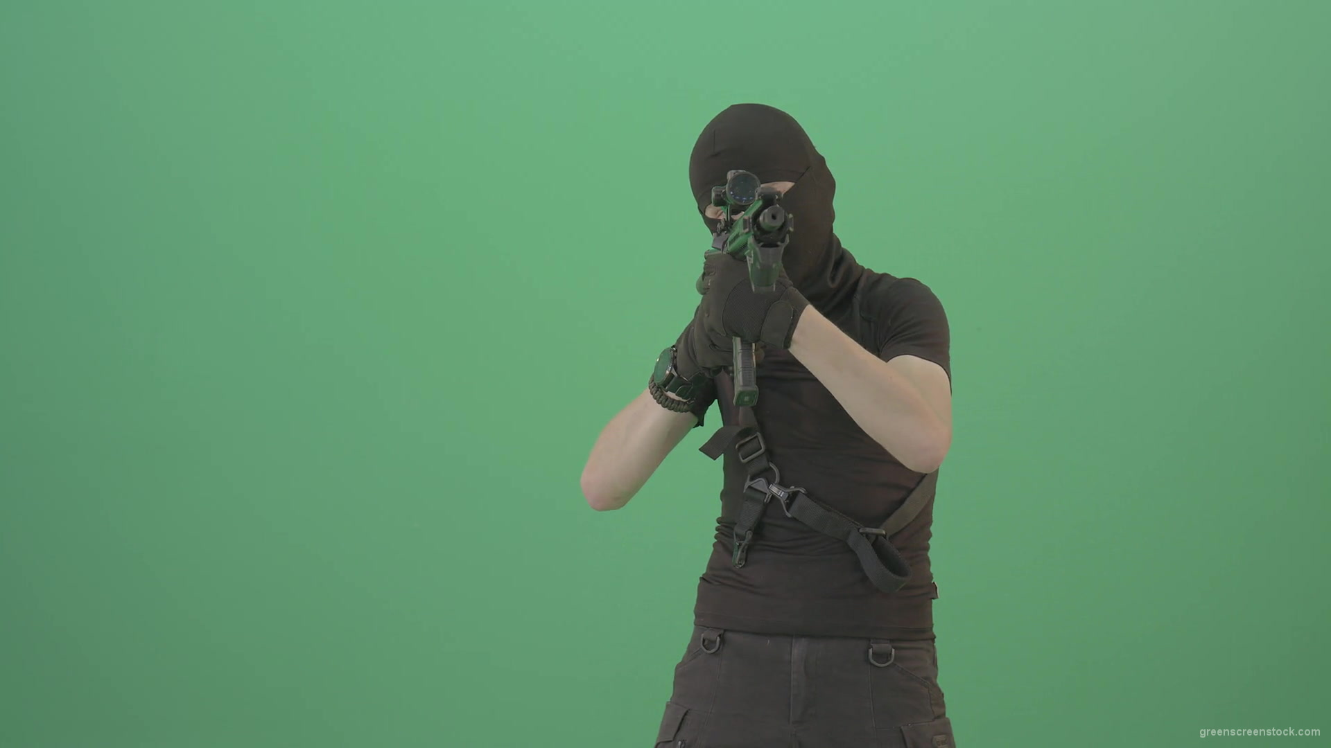 Soldier-in-black-mask-shooting-enemies-with-military-gun-on-green-screen-4K-Video-Footage-1920_008 Green Screen Stock
