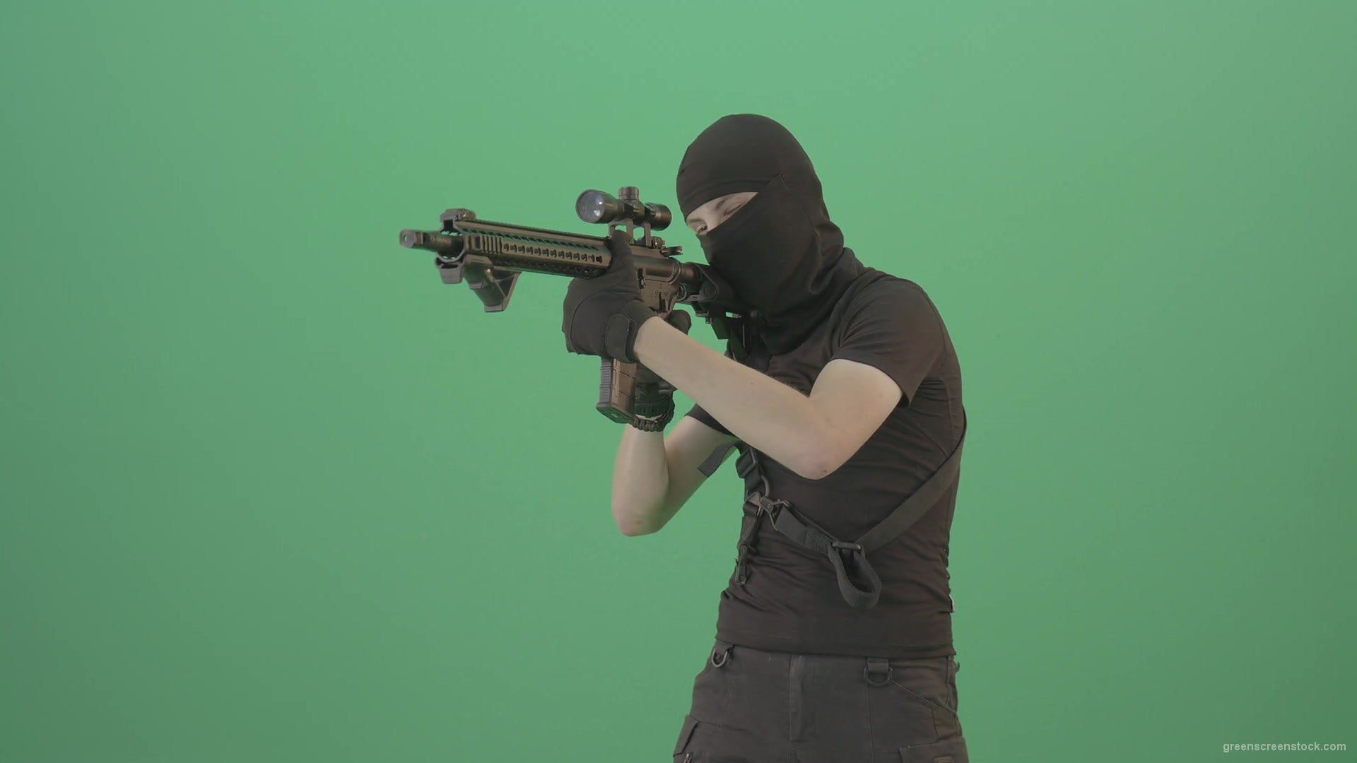 Soldier-in-black-mask-shooting-enemies-with-military-gun-on-green-screen-4K-Video-Footage-1920_009 Green Screen Stock