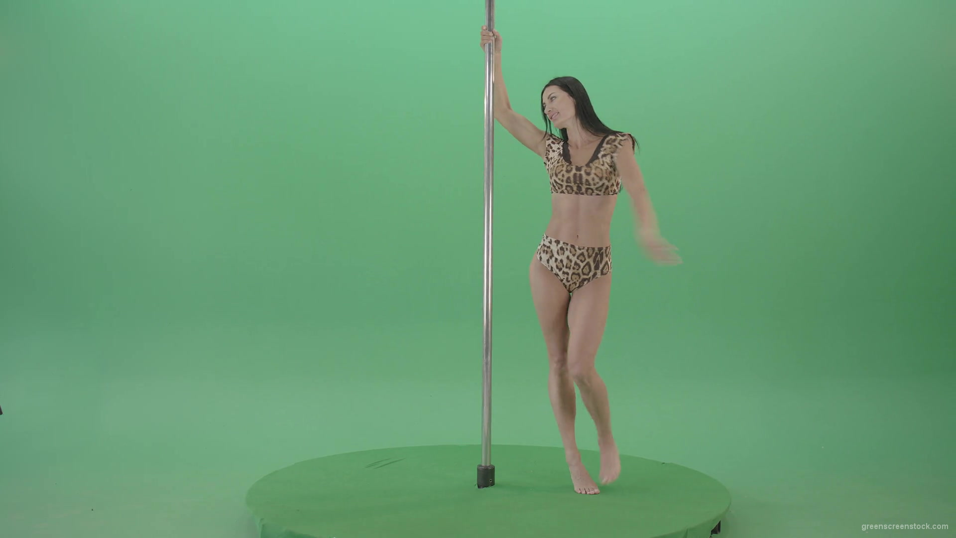 Stripteas-Girl-in-leopard-skin-wear-spinning-on-pilon-dancing-pole-isolated-on-Green-Screen-4K-Video-Footage-1920_002 Green Screen Stock