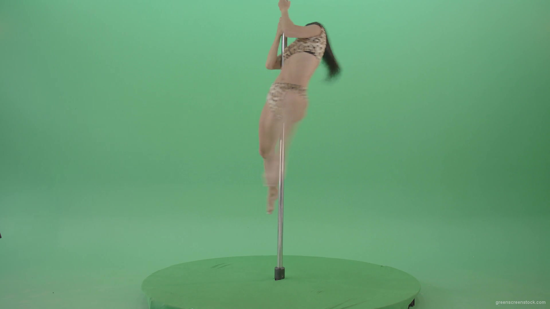 Stripteas-Girl-in-leopard-skin-wear-spinning-on-pilon-dancing-pole-isolated-on-Green-Screen-4K-Video-Footage-1920_005 Green Screen Stock